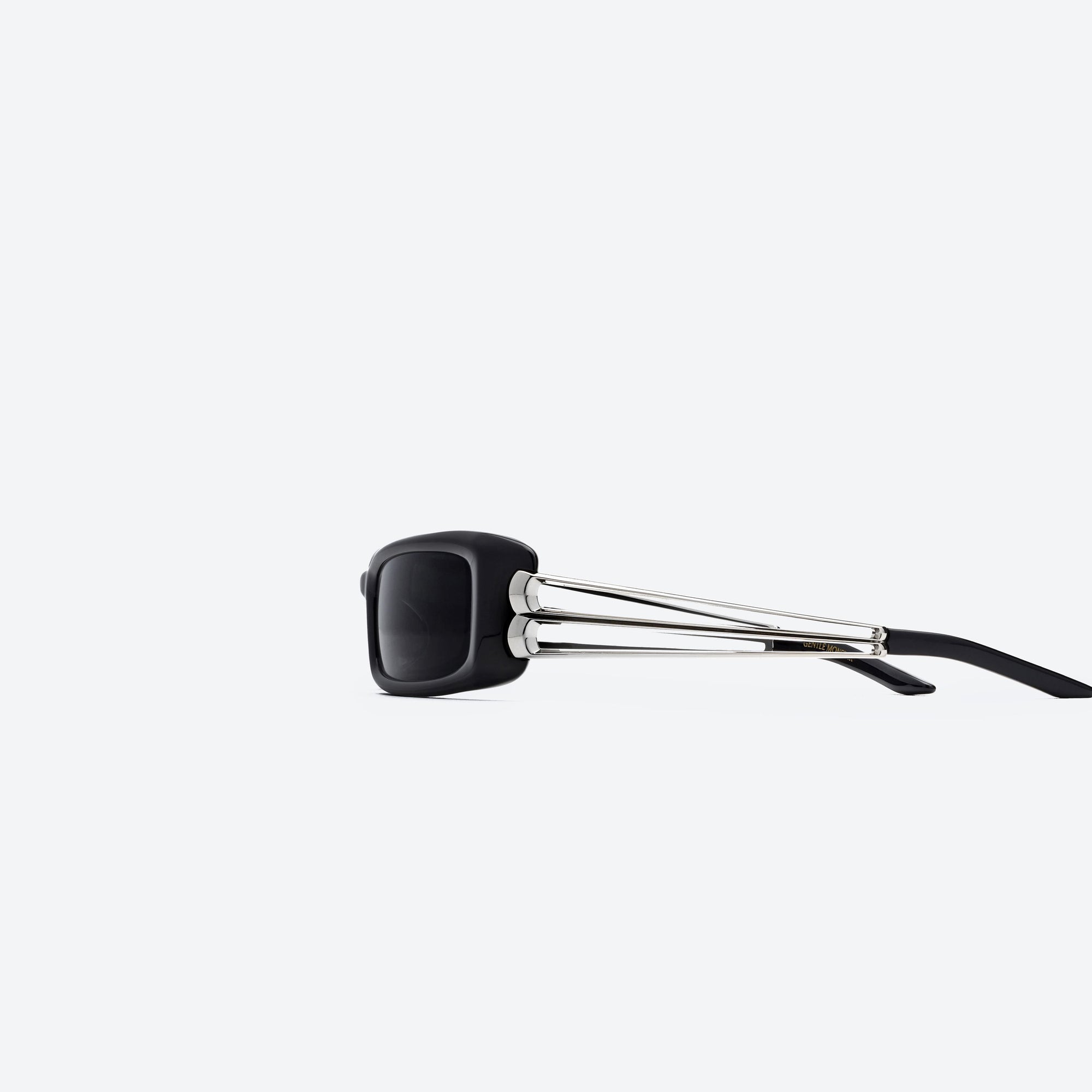 A detailed left view of Gentle Monster Wire Lip 01 Black Mixed framed Square sunglasses.