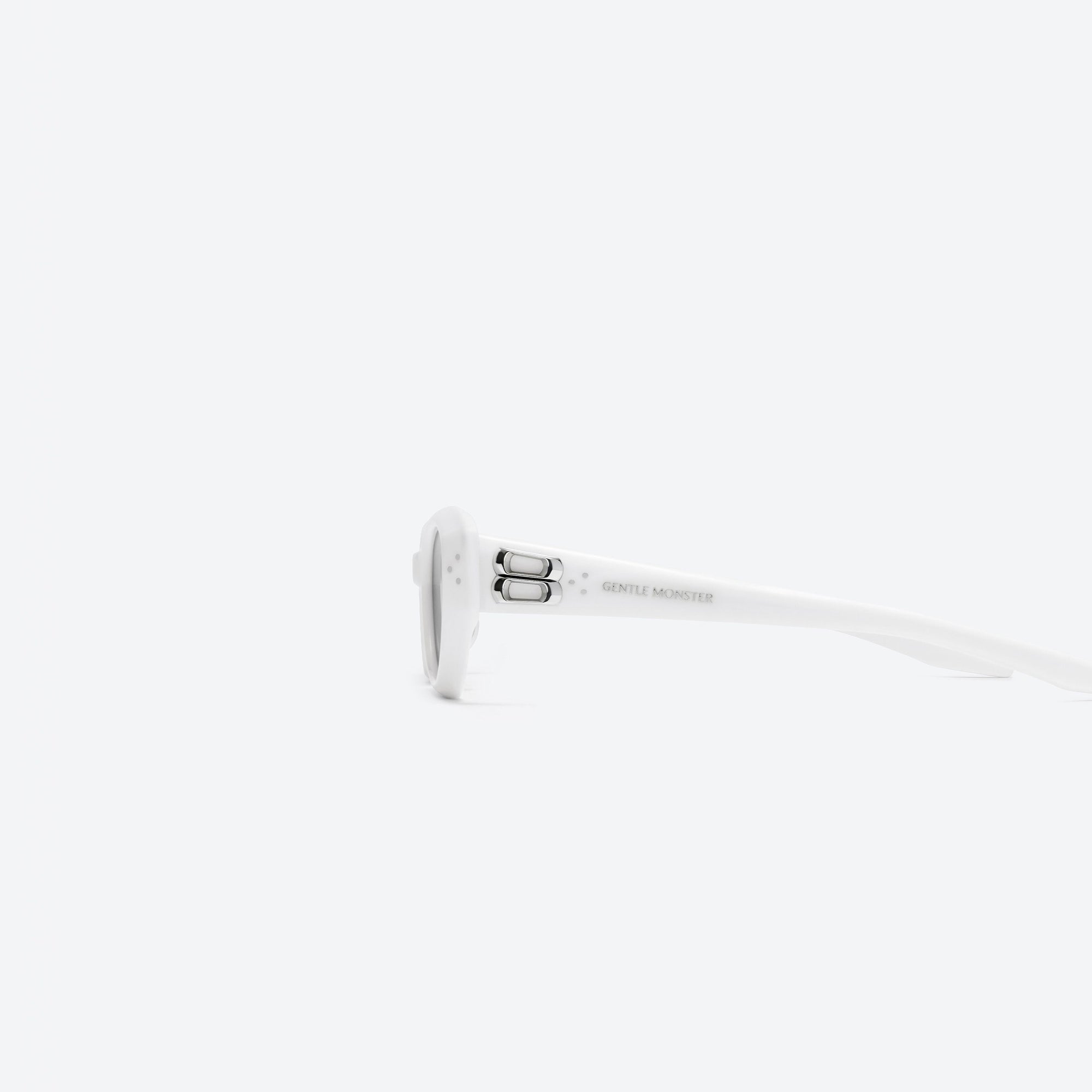A detailed left view of Gentle Monster Duns W2 White Acetate framed Cat-eye sunglasses.