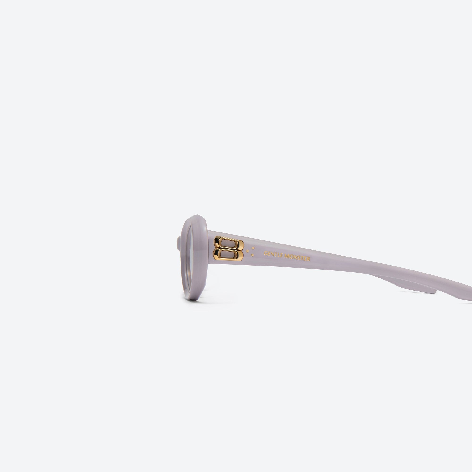A detailed left view of Gentle Monster Cocoa V4 Purple Acetate framed Oval sunglasses.