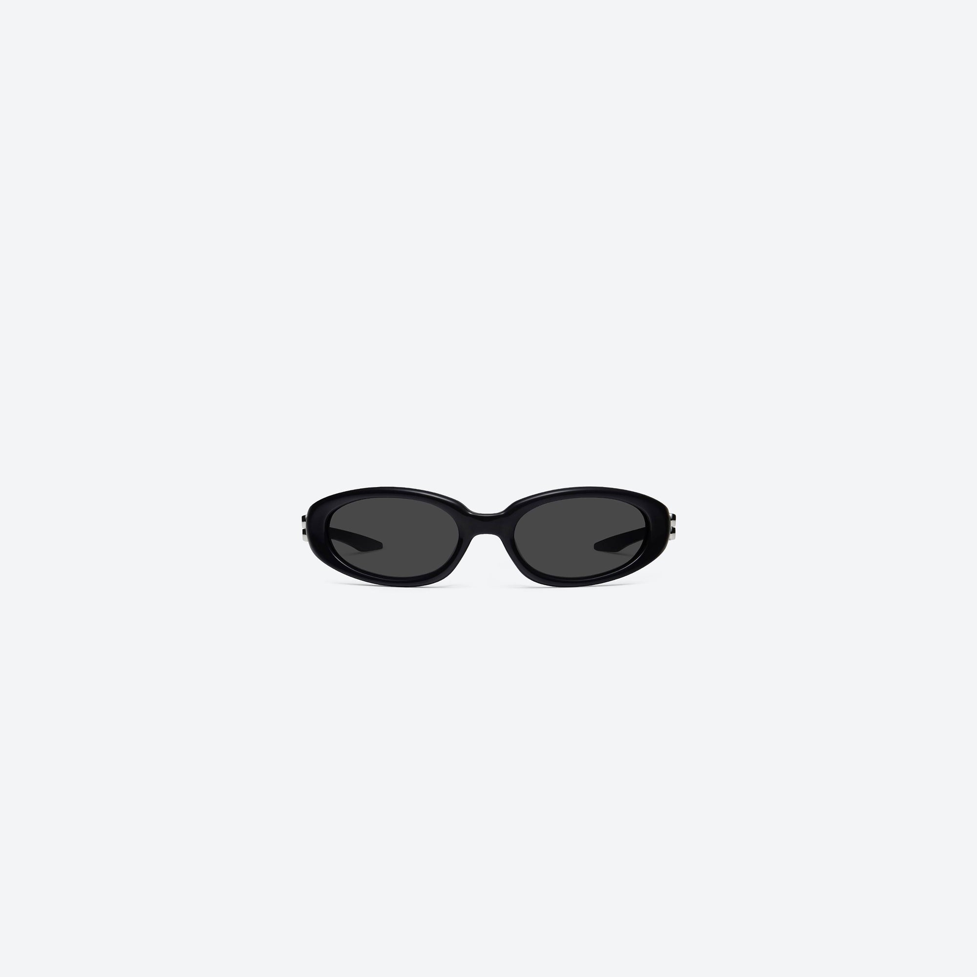 A front view of Gentle Monster Monde 01 Black Acetate framed Oval sunglasses.