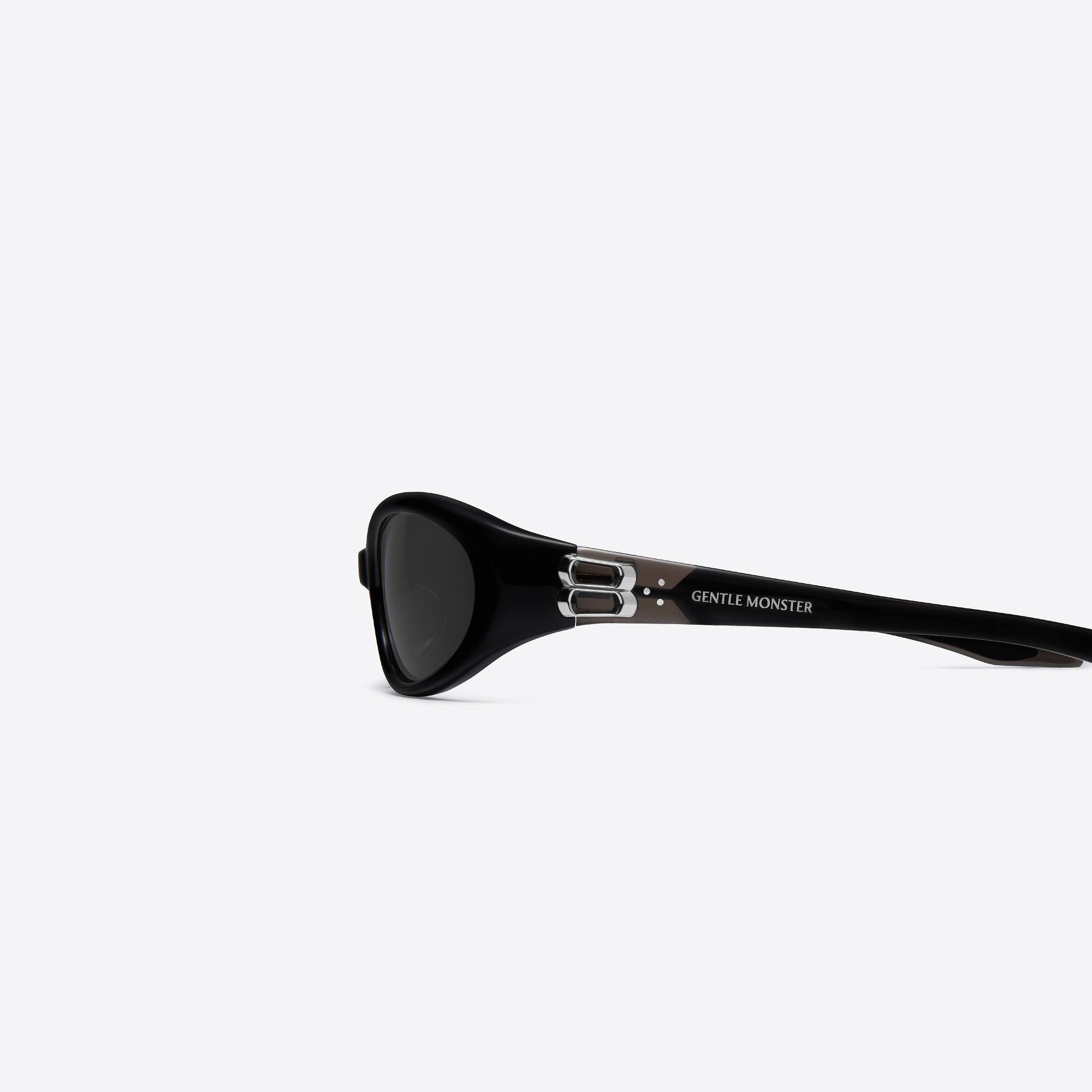 A detailed left view of Gentle Monster Monde 01 Black Acetate framed Oval sunglasses.