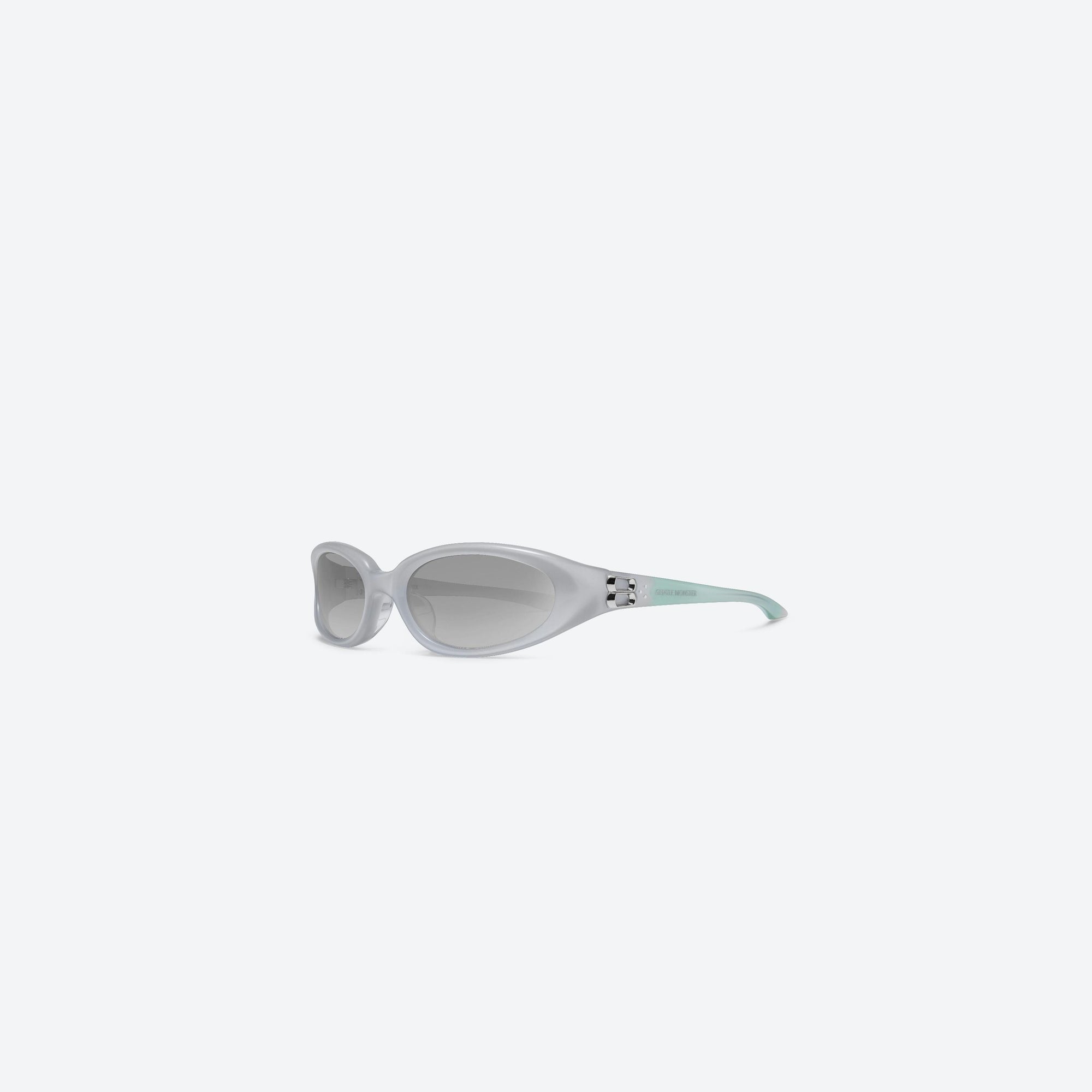 45-degree view of Gentle Monster Monde GC11 Gray Acetate framed Oval sunglasses.