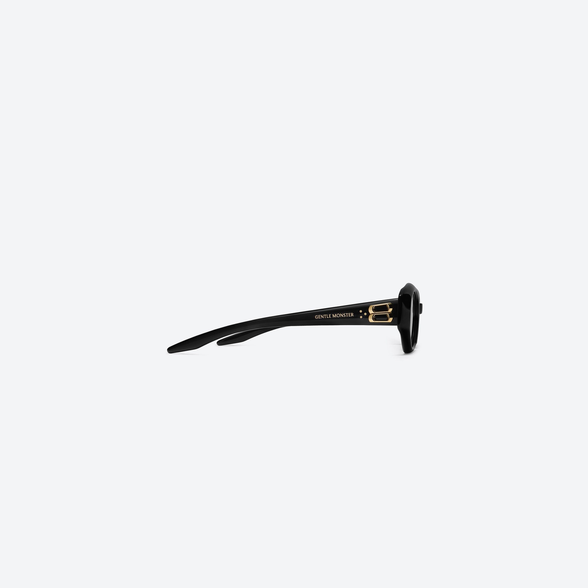 A detailed right view of Gentle Monster Miro 01 Black Acetate framed Oval sunglasses.