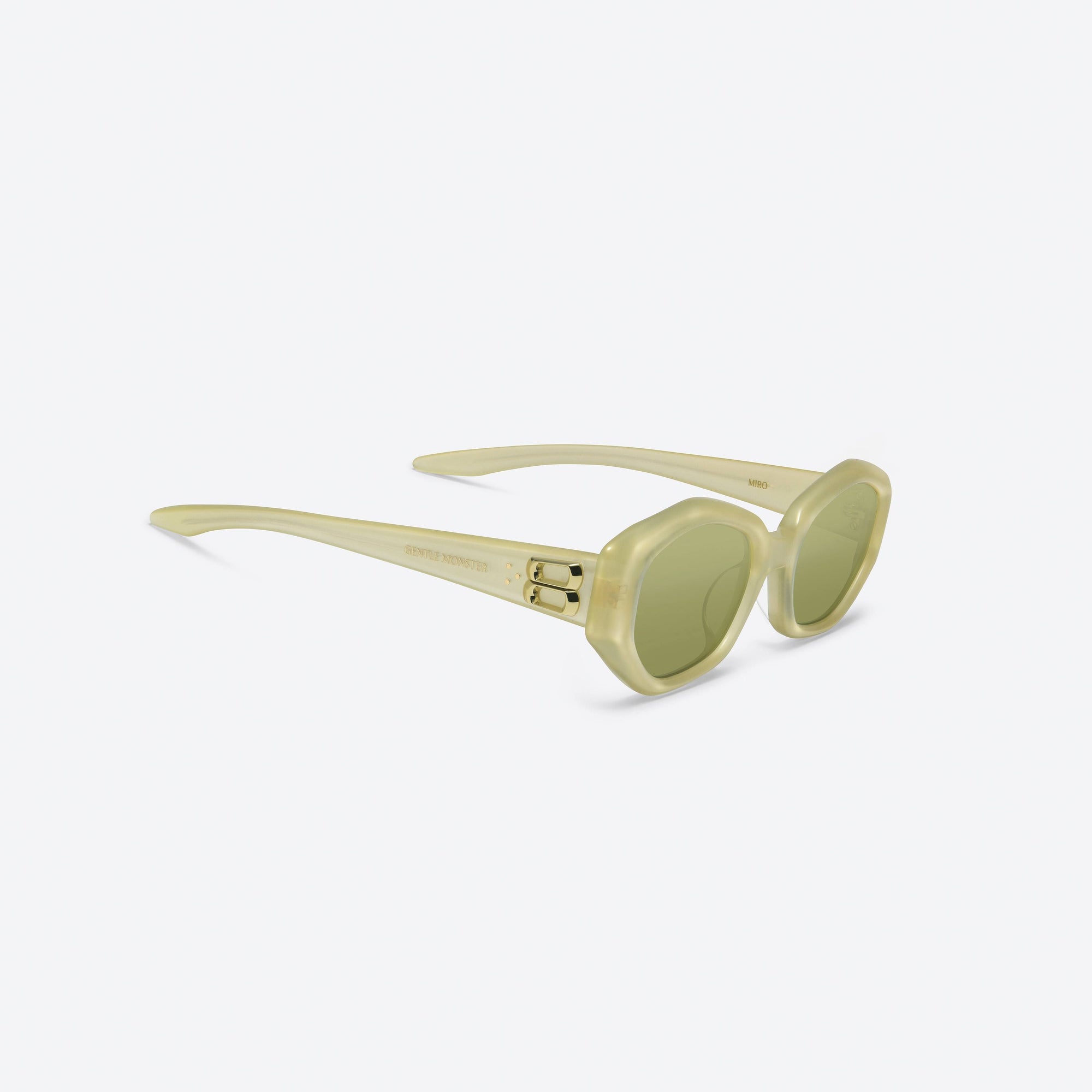 45-degree detailed view of Gentle Monster Miro YC10 Yellow Acetate framed Oval sunglasses.