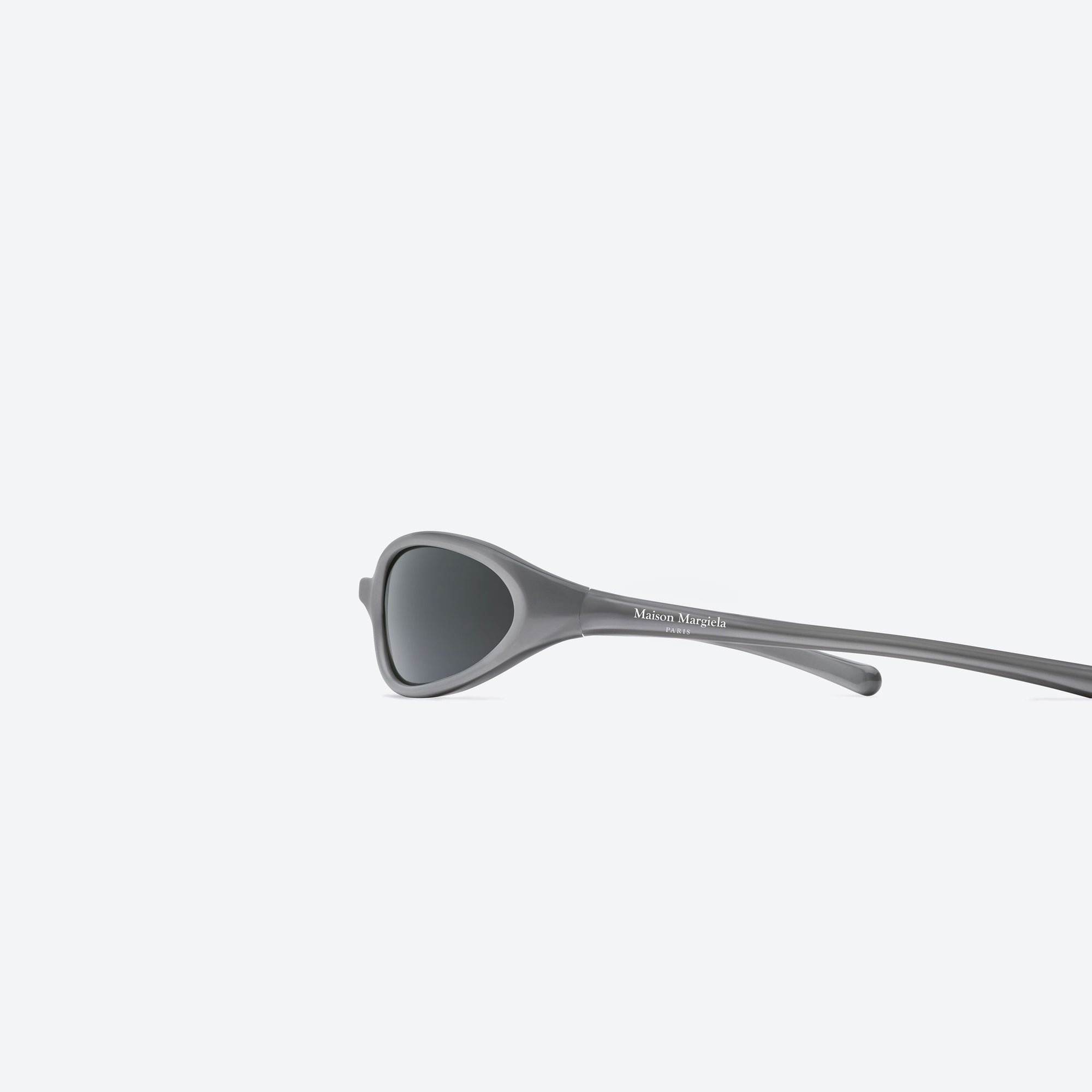 A detailed left view of Gentle Monster Maison Margiela - MM202 G14(SM) Silver Acetate framed Wraparound sunglasses.