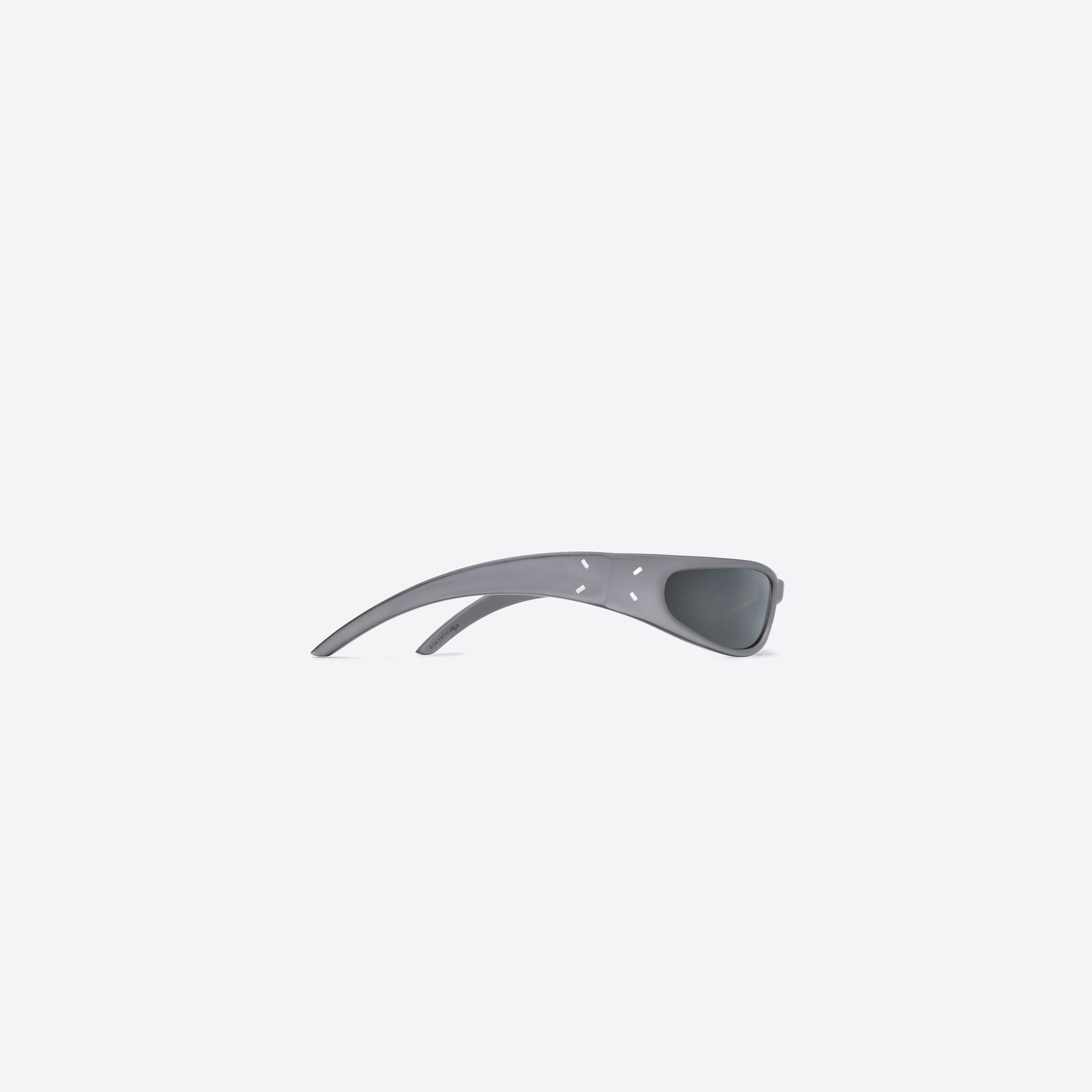 A detailed right view of Gentle Monster Maison Margiela - MM203 G14(SM) Silver Acetate framed Wraparound sunglasses.