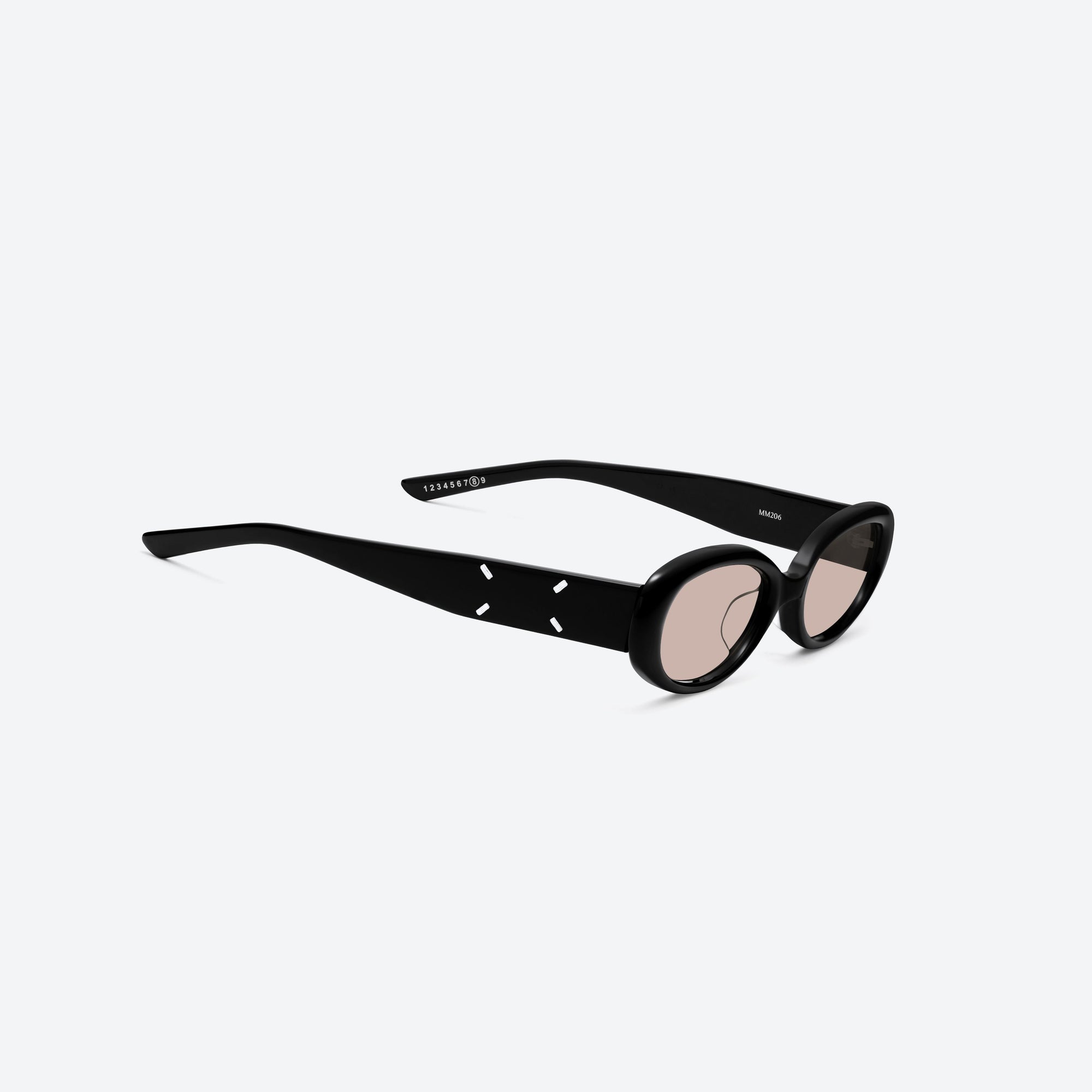 45-degree detailed view of Gentle Monster Maison Margiela - MM206 01(BR) Black Acetate framed Oval sunglasses.