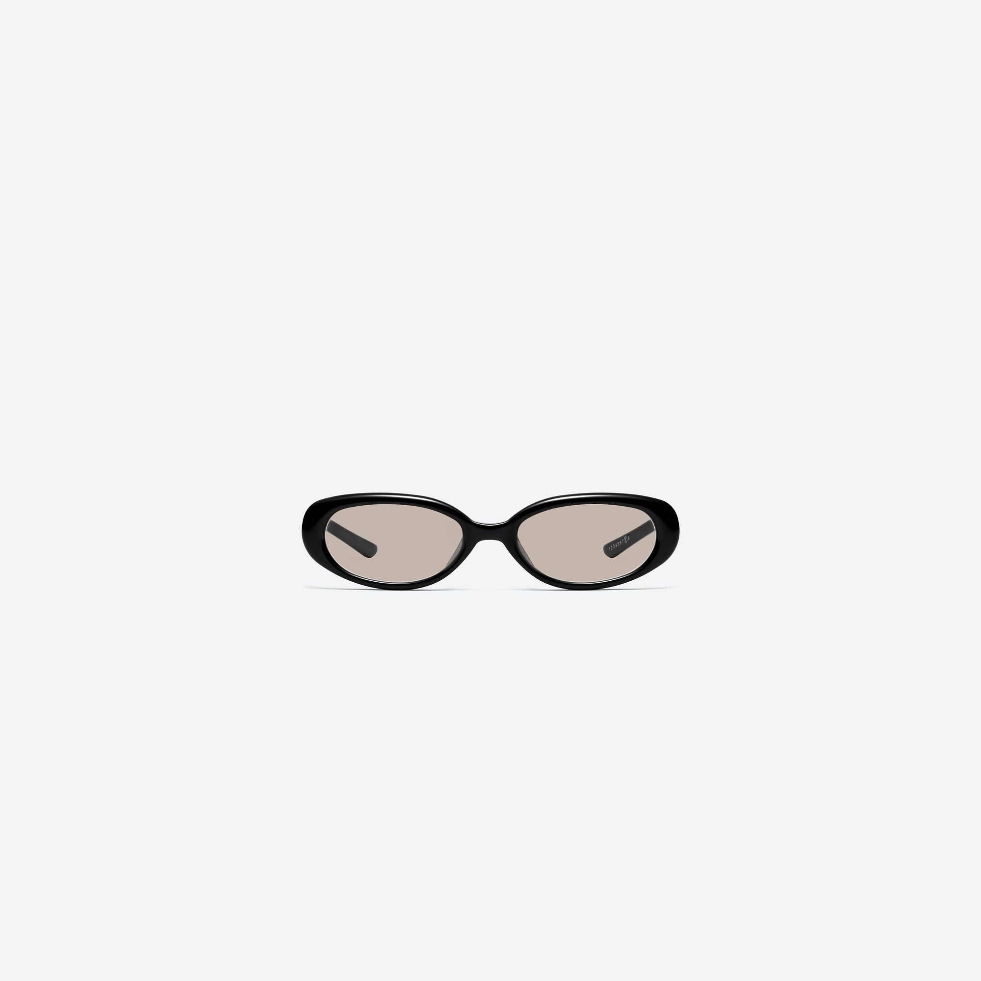 A front view of Gentle Monster Maison Margiela - MM206 01(BR) Black Acetate framed Oval sunglasses.