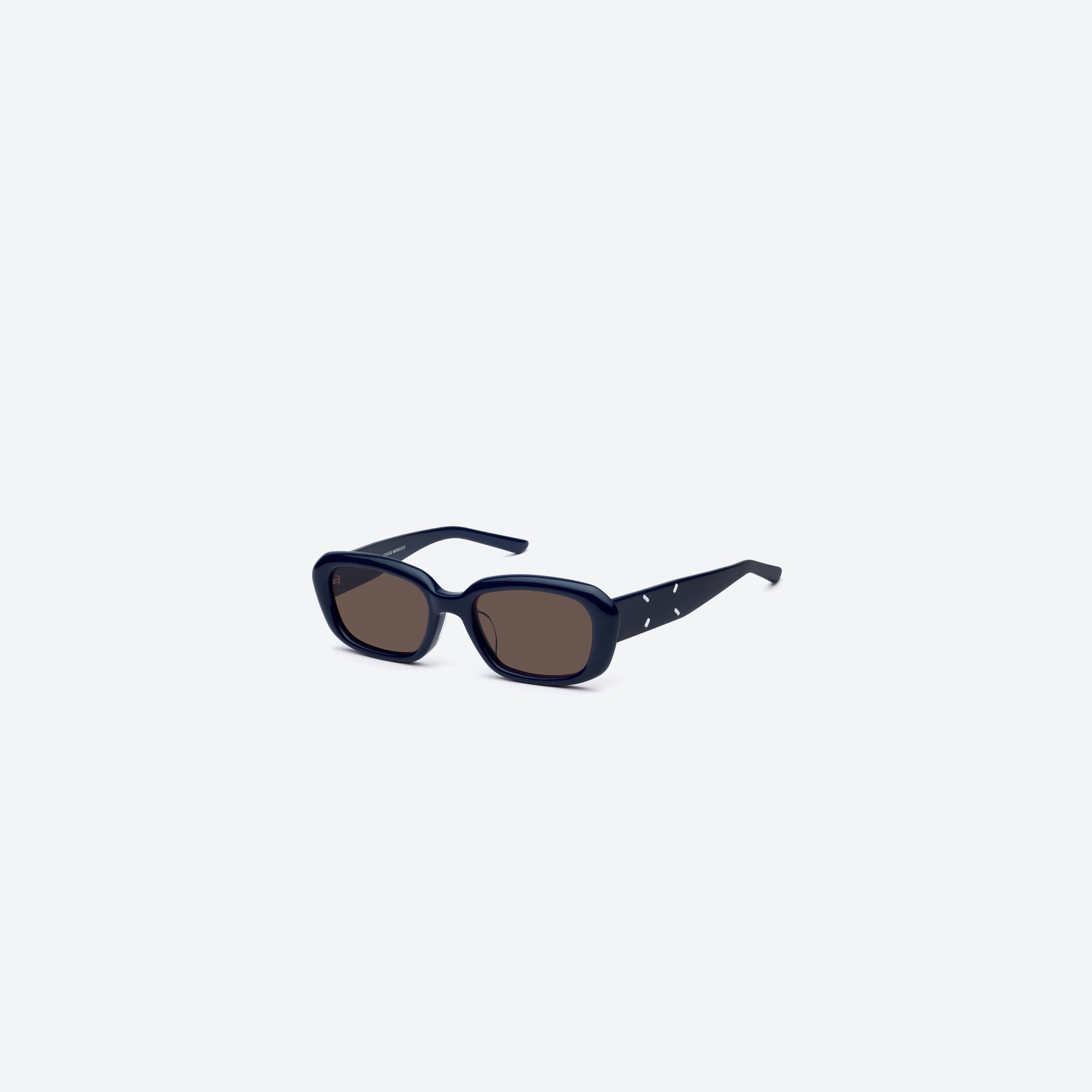 45-degree view of Gentle Monster Maison Margiela - MM207 N6(BR) Blue Acetate framed Square sunglasses.