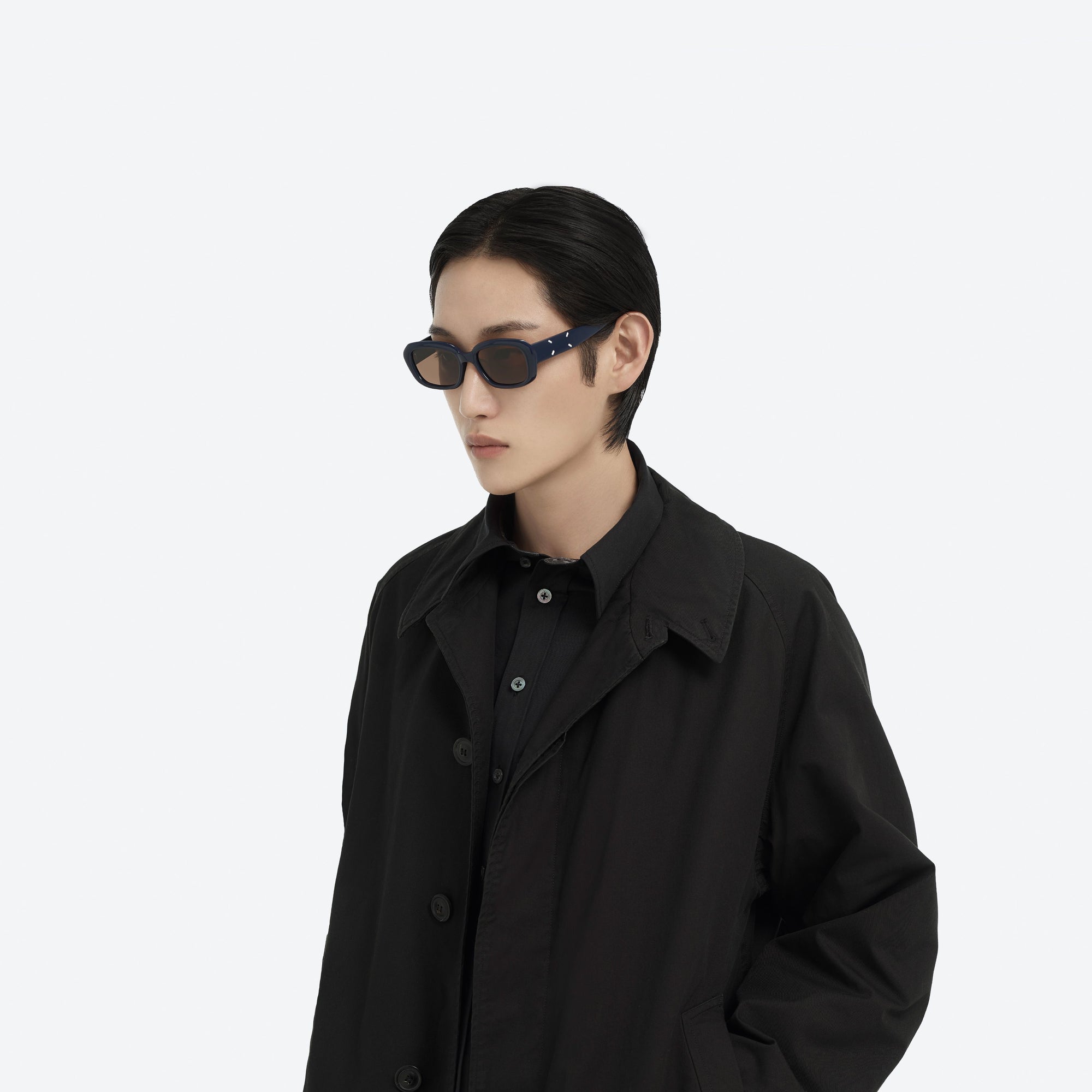 Model wearing the Maison Margiela - MM207 N6(BR) Blue Acetate framed Square sunglasses.