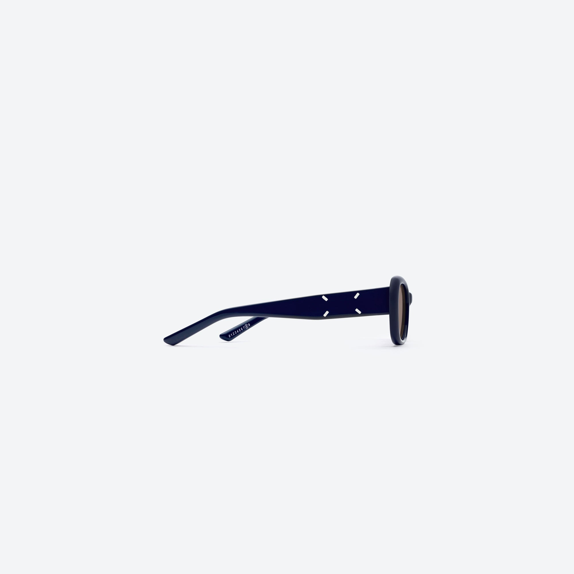 A detailed right view of Gentle Monster Maison Margiela - MM207 N6(BR) Blue Acetate framed Square sunglasses.