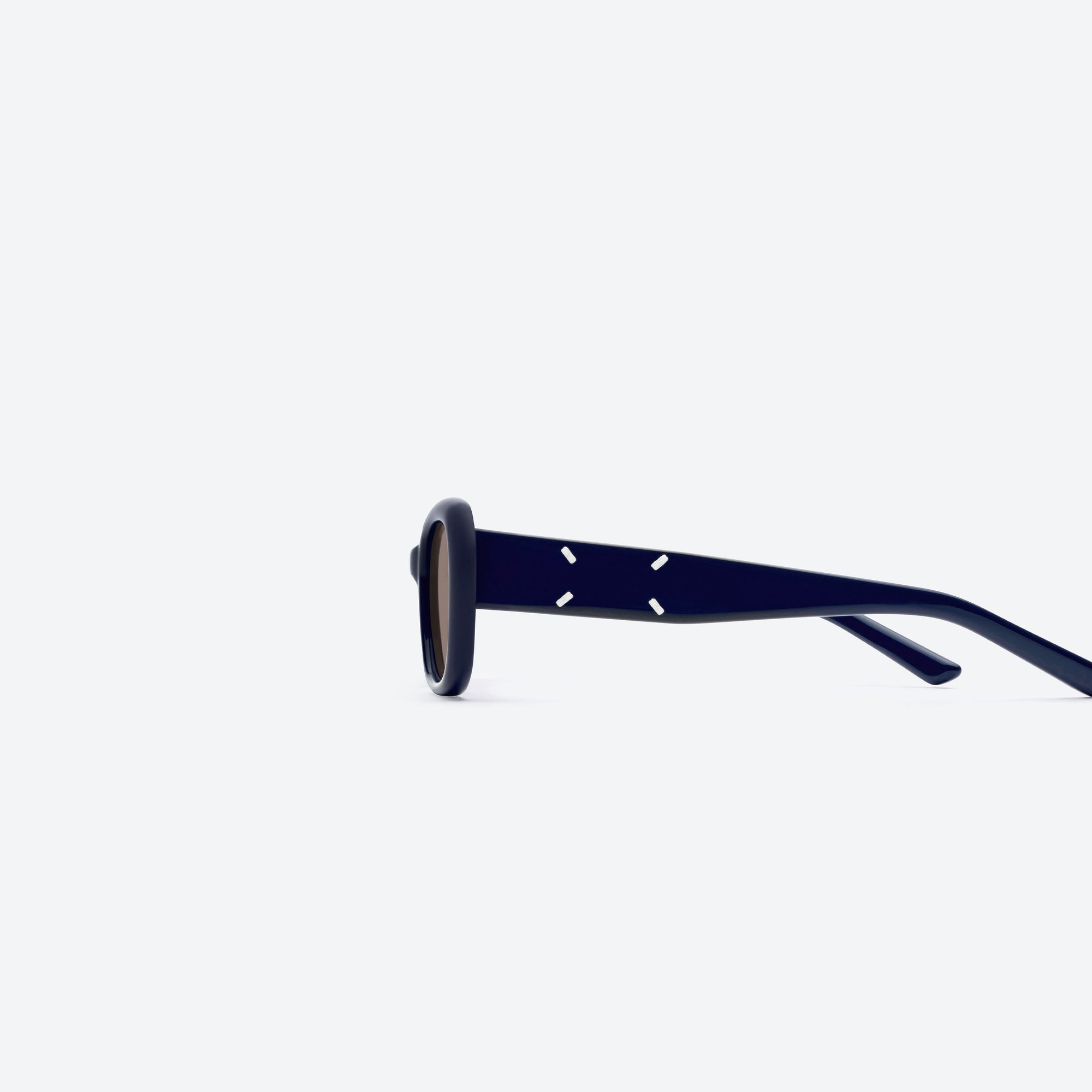 A detailed left view of Gentle Monster Maison Margiela - MM207 N6(BR) Blue Acetate framed Square sunglasses.