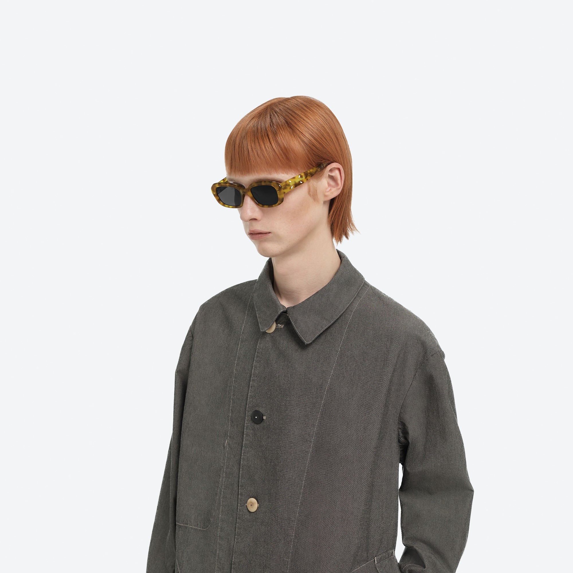 Model wearing the Maison Margiela - MM207 T6 Tortoise Acetate framed Square sunglasses.