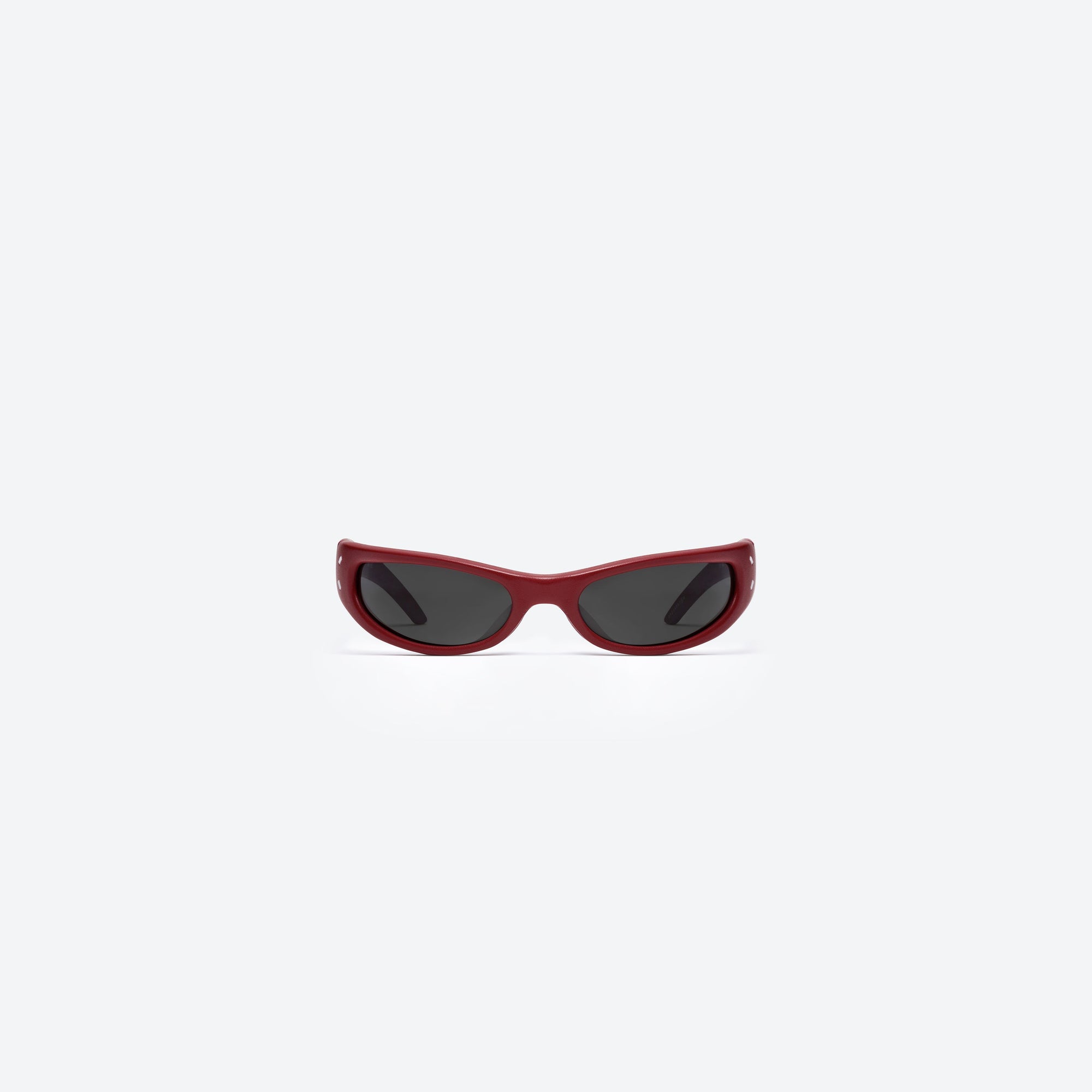 A front view of Gentle Monster Maison Margiela - MM203 Leather LR1 Red Acetate framed Oval sunglasses.