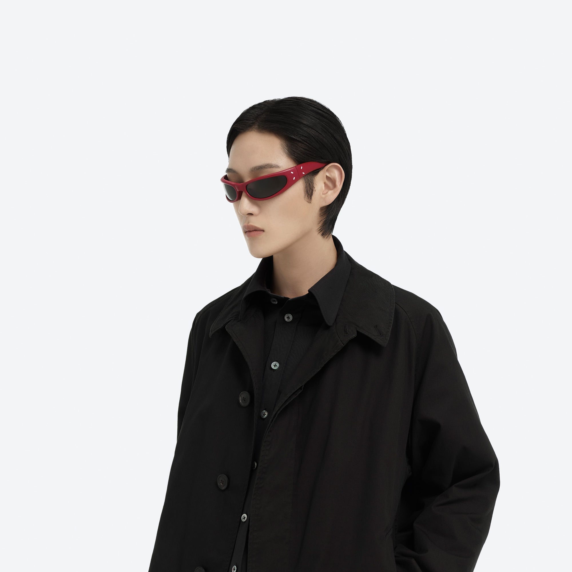 Model wearing the Maison Margiela - MM203 Leather LR1 Red Acetate framed Oval sunglasses.
