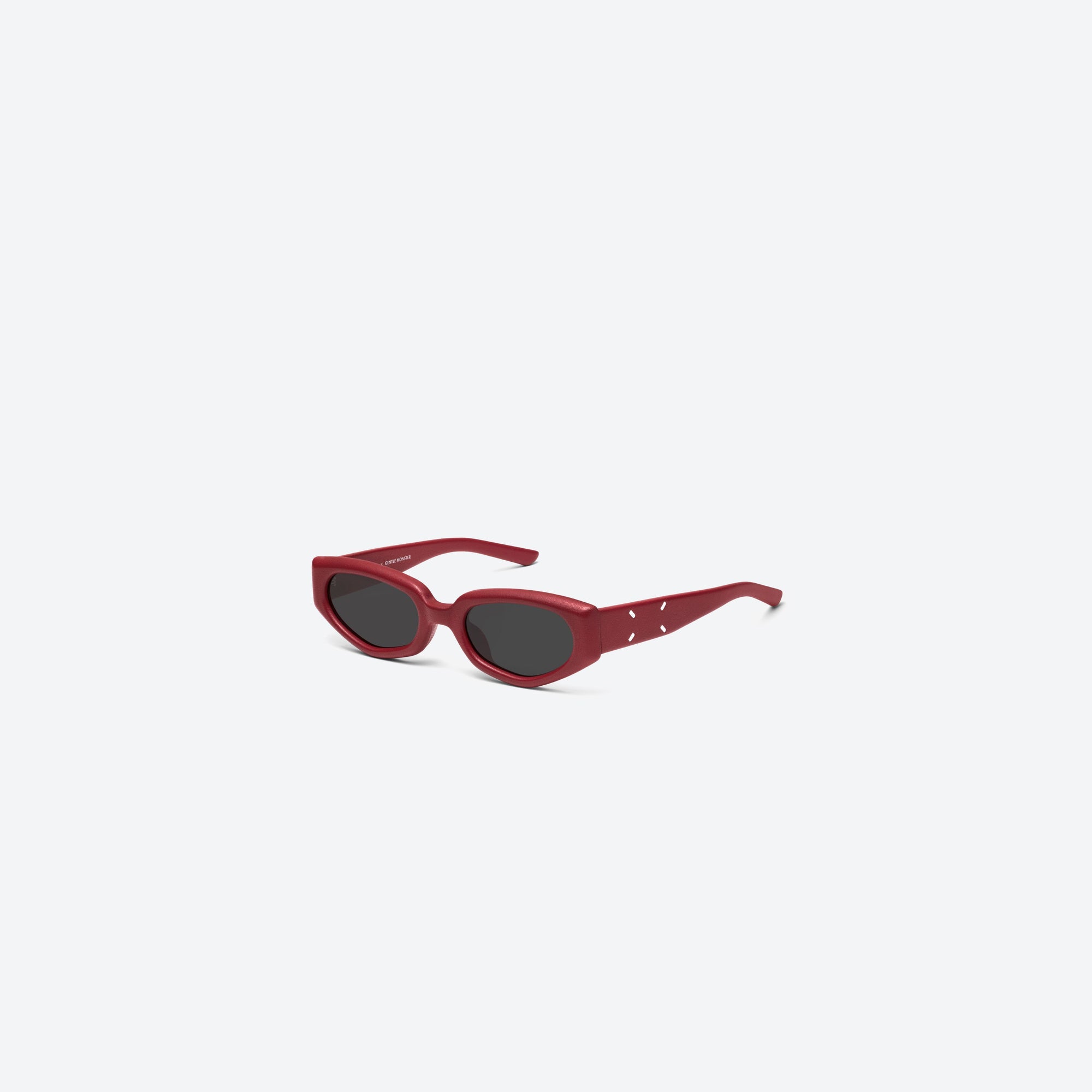 45-degree view of Gentle Monster Maison Margiela - MM205 Leather LR1 Red Acetate framed Cat-eye sunglasses.