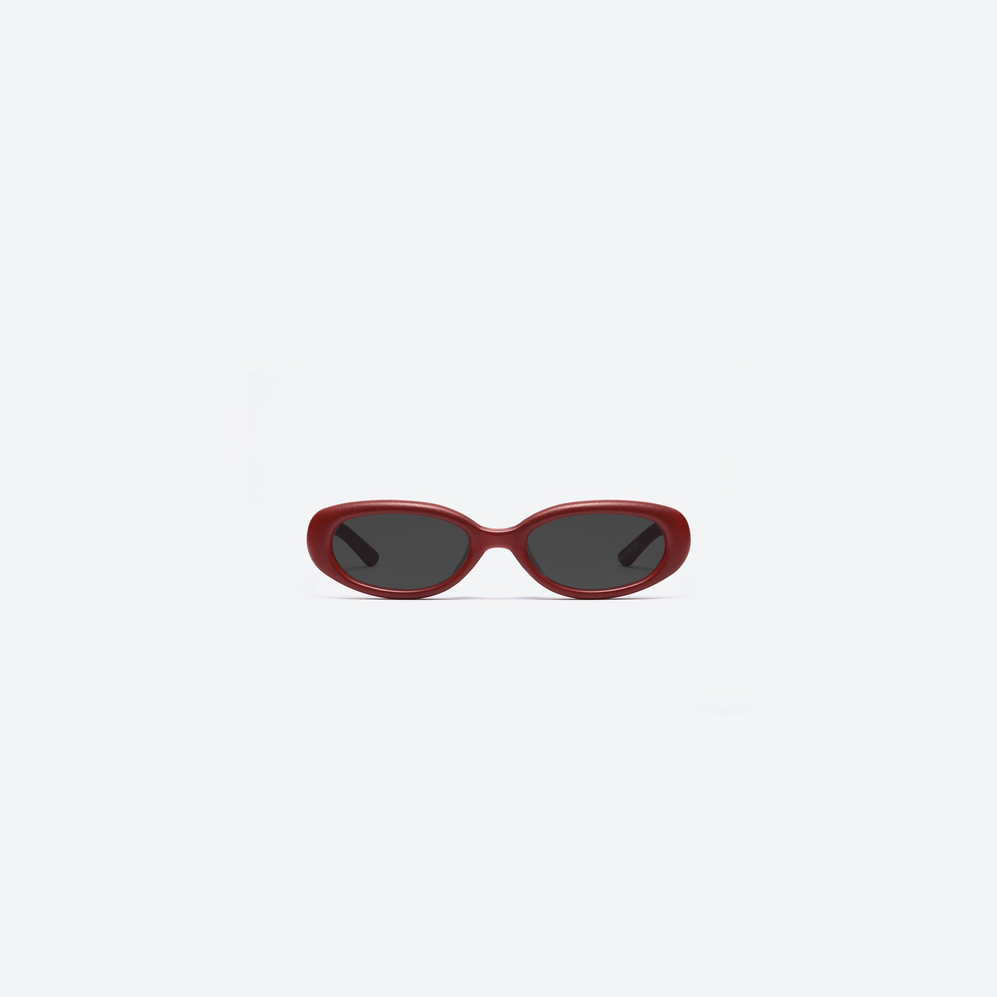 A front view of Gentle Monster Maison Margiela - MM206 Leather LR1 Red Acetate framed Oval sunglasses.