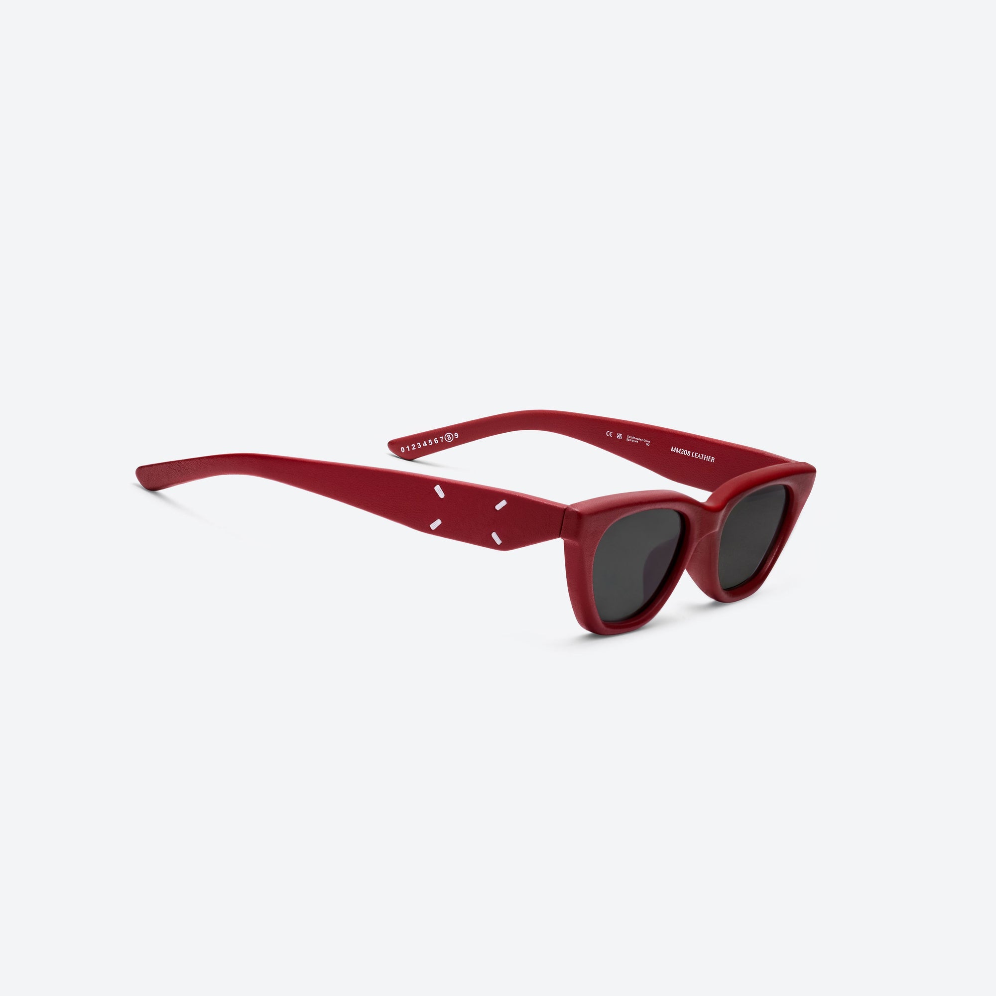 45-degree detailed view of Gentle Monster Maison Margiela - MM208 Leather LR1 Red Acetate framed Cat-eye sunglasses.