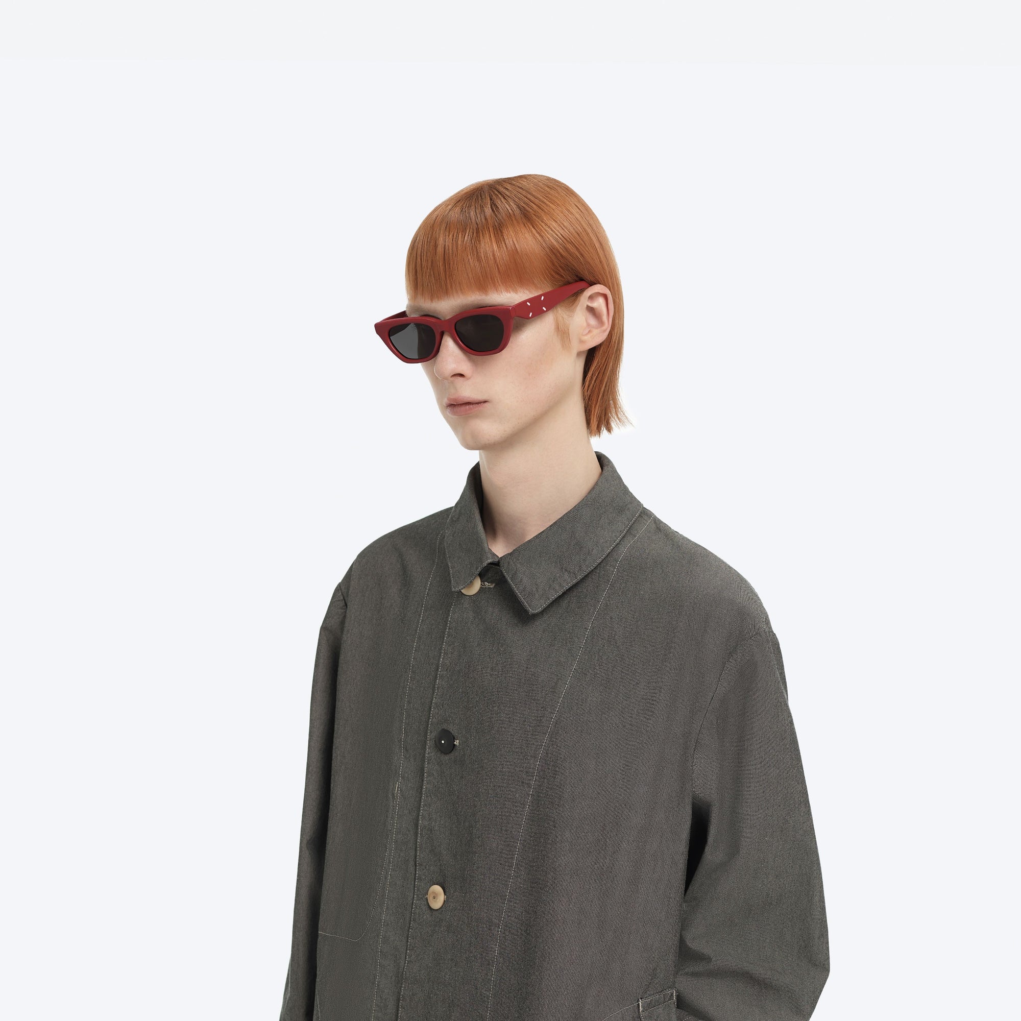 Model wearing the Maison Margiela - MM208 Leather LR1 Red Acetate framed Cat-eye sunglasses.