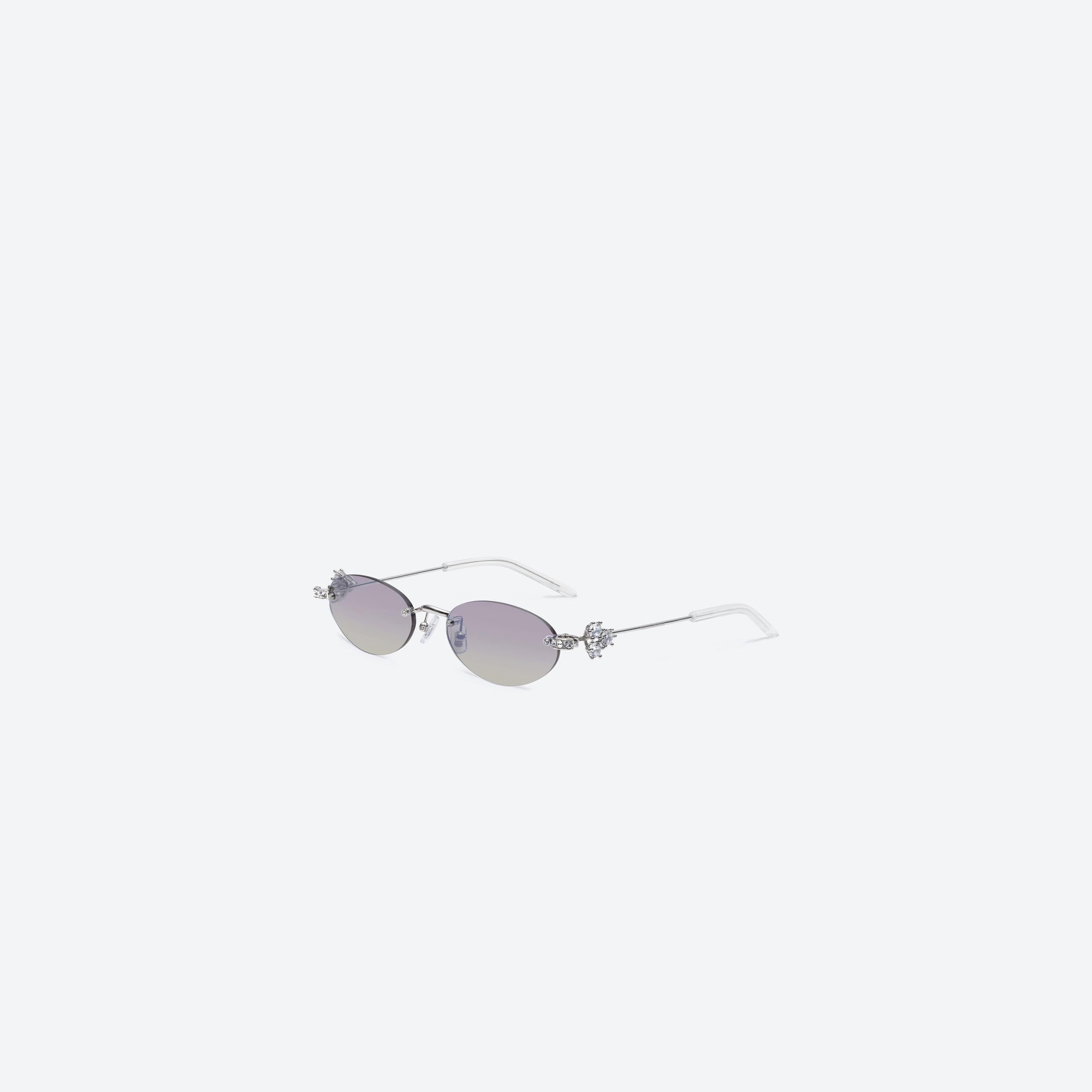 45-degree view of Gentle Monster Orora 02(VYG) Silver Metal framed Oval sunglasses.