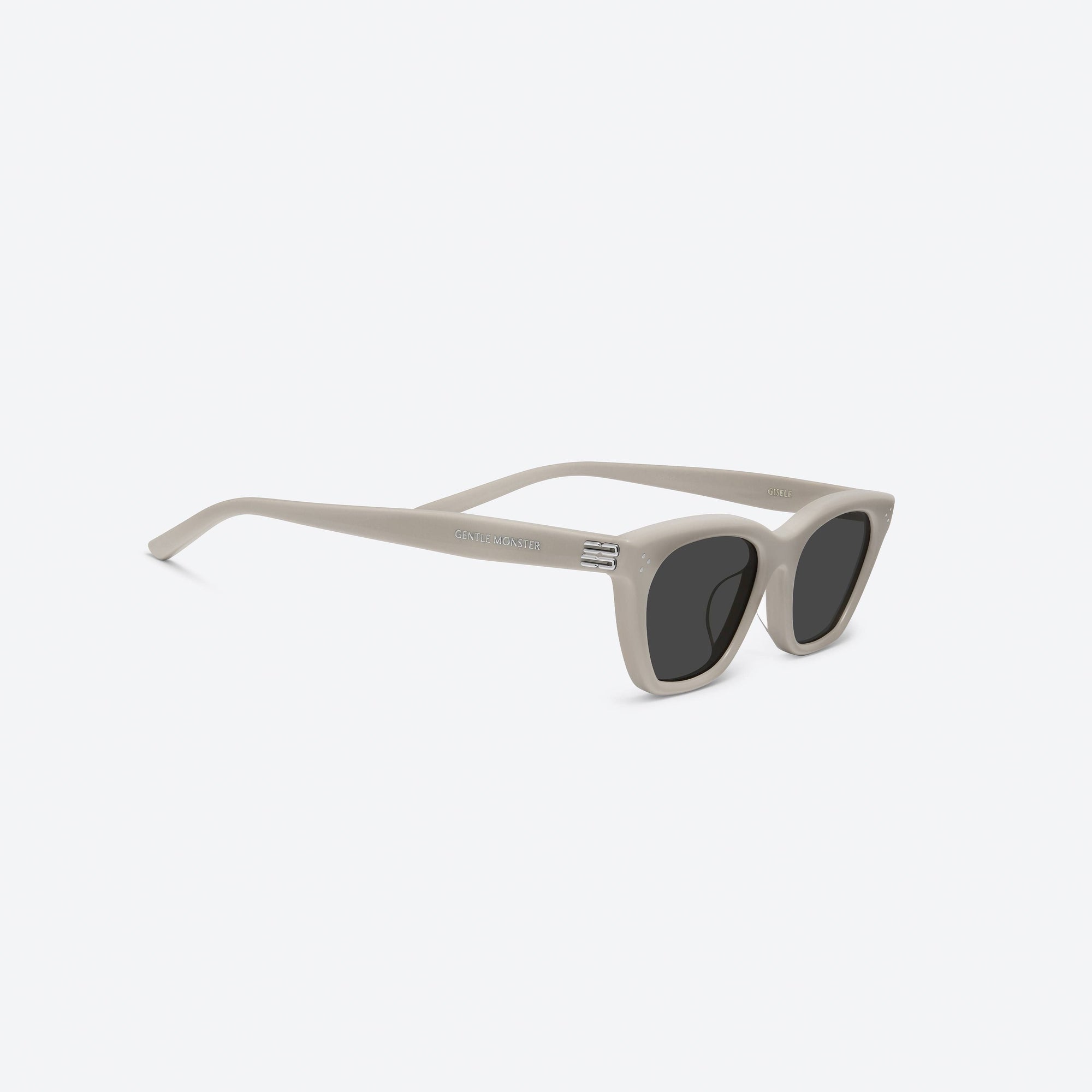 45-degree detailed view of Gentle Monster Gisele IV3 Ivory Acetate framed Cat-eye sunglasses.