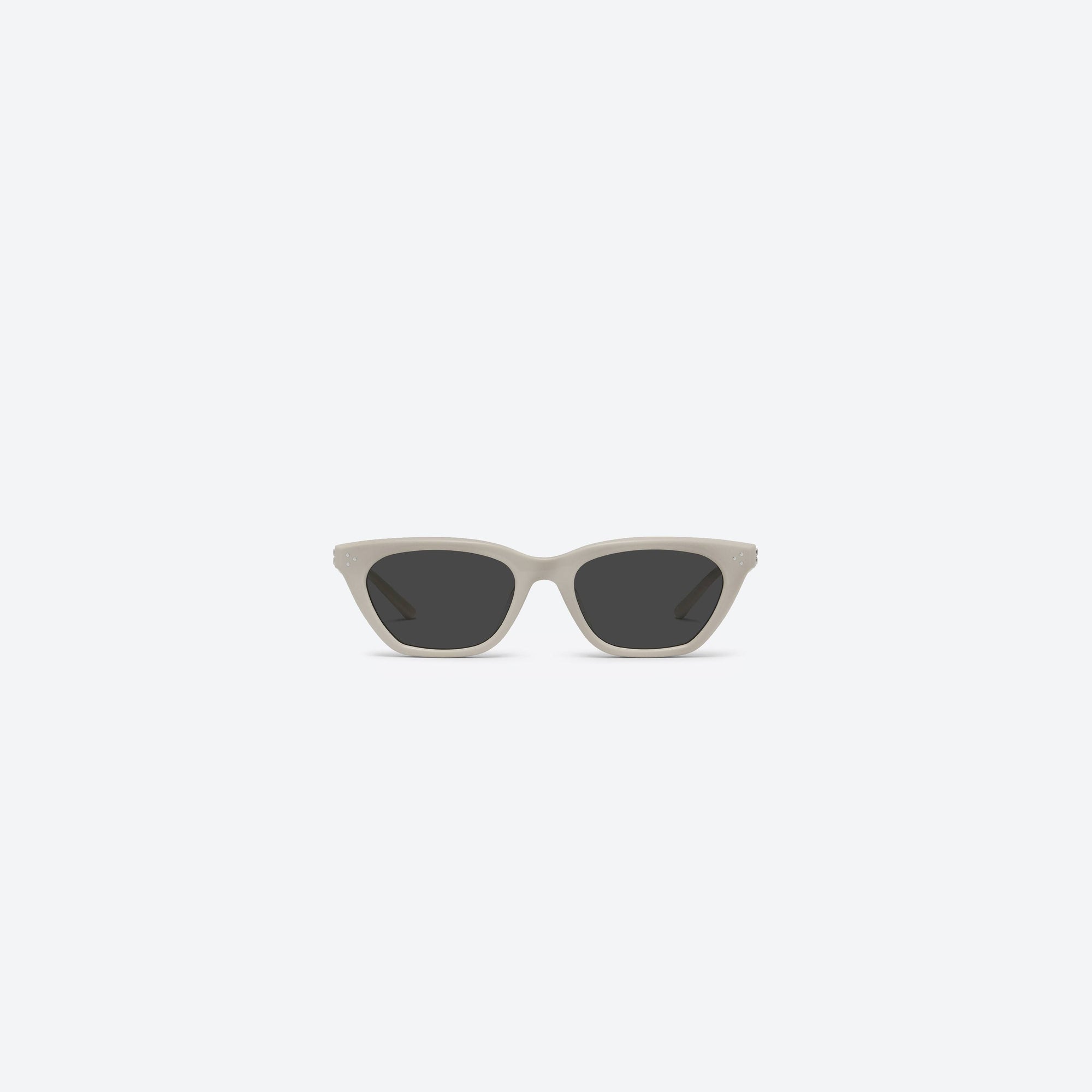A front view of Gentle Monster Gisele IV3 Ivory Acetate framed Cat-eye sunglasses.