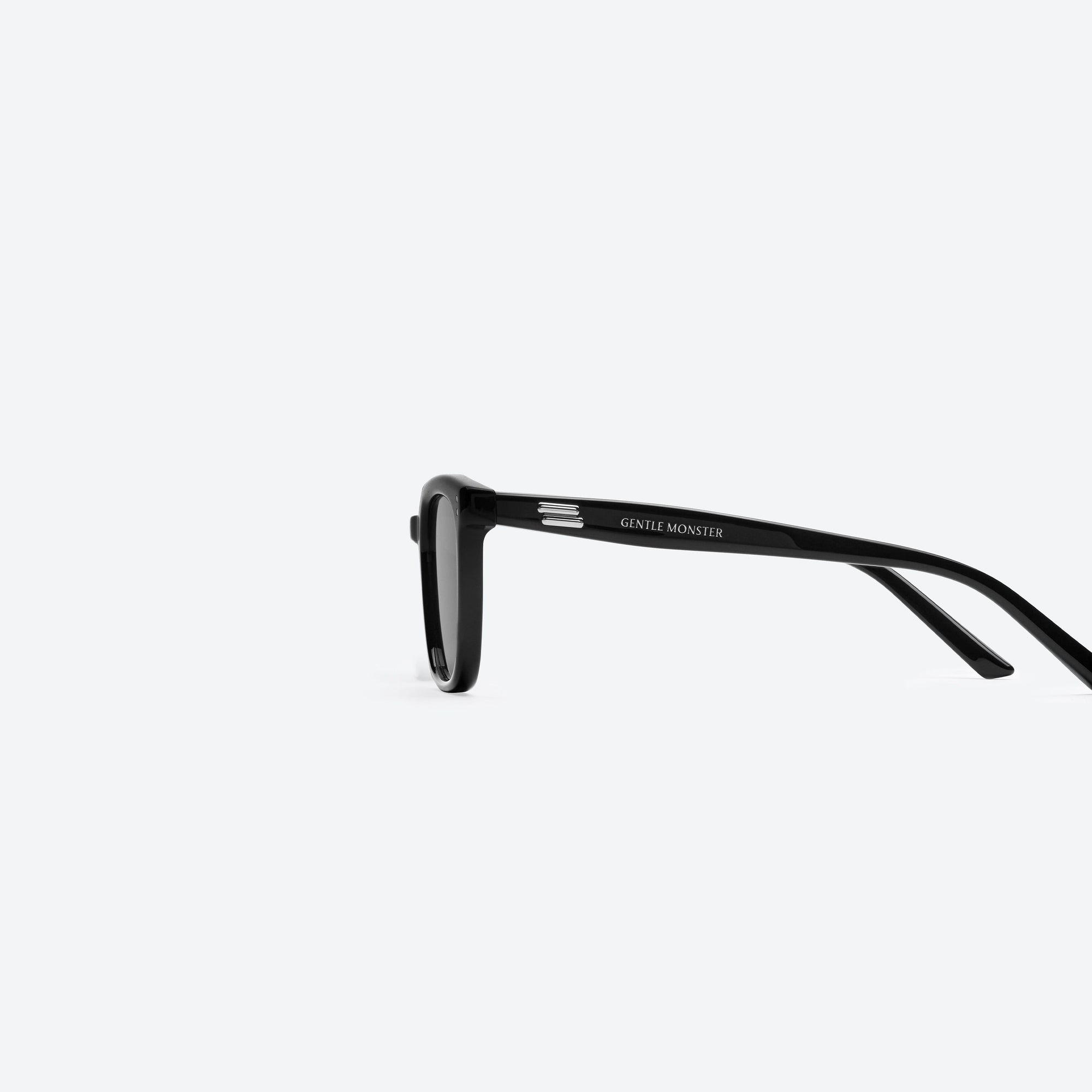 A detailed left view of Gentle Monster Days Day 01 Black Acetate framed Square sunglasses.