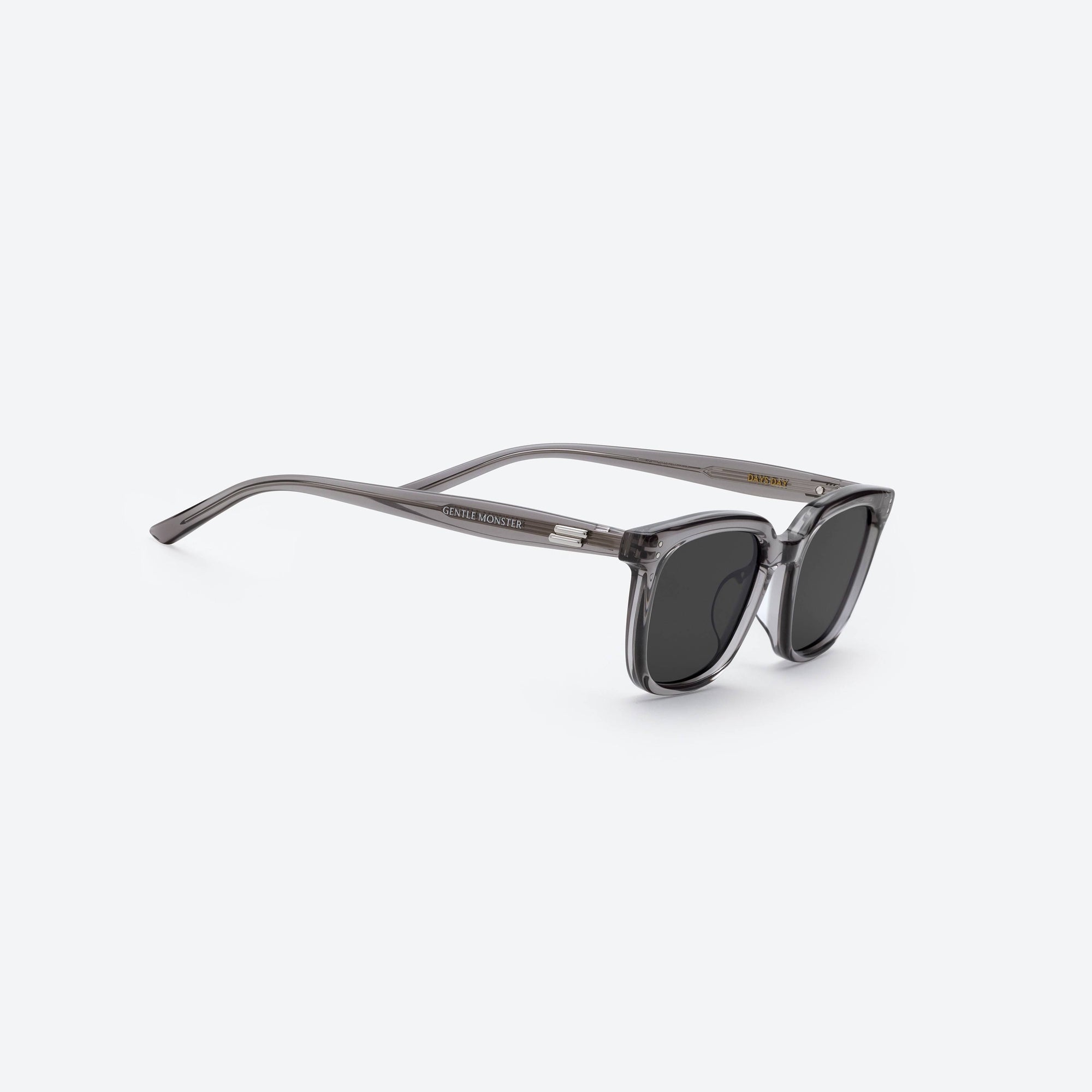 45-degree detailed view of Gentle Monster Days Day GC12 Gray Acetate framed Square sunglasses.