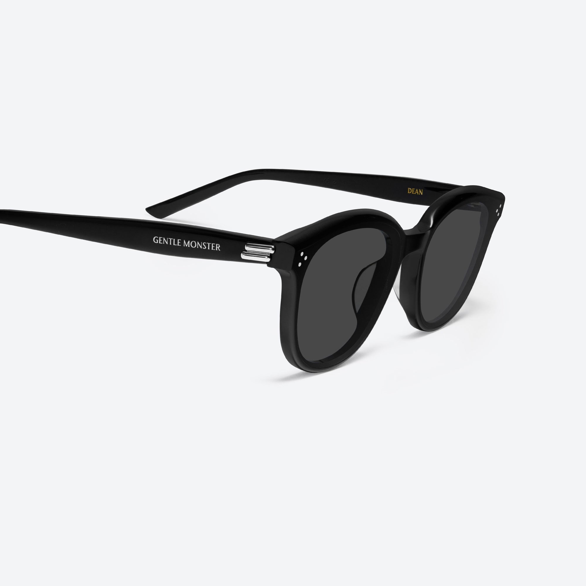 45-degree detailed view of Gentle Monster Dean 01 Black Acetate framed Round sunglasses.