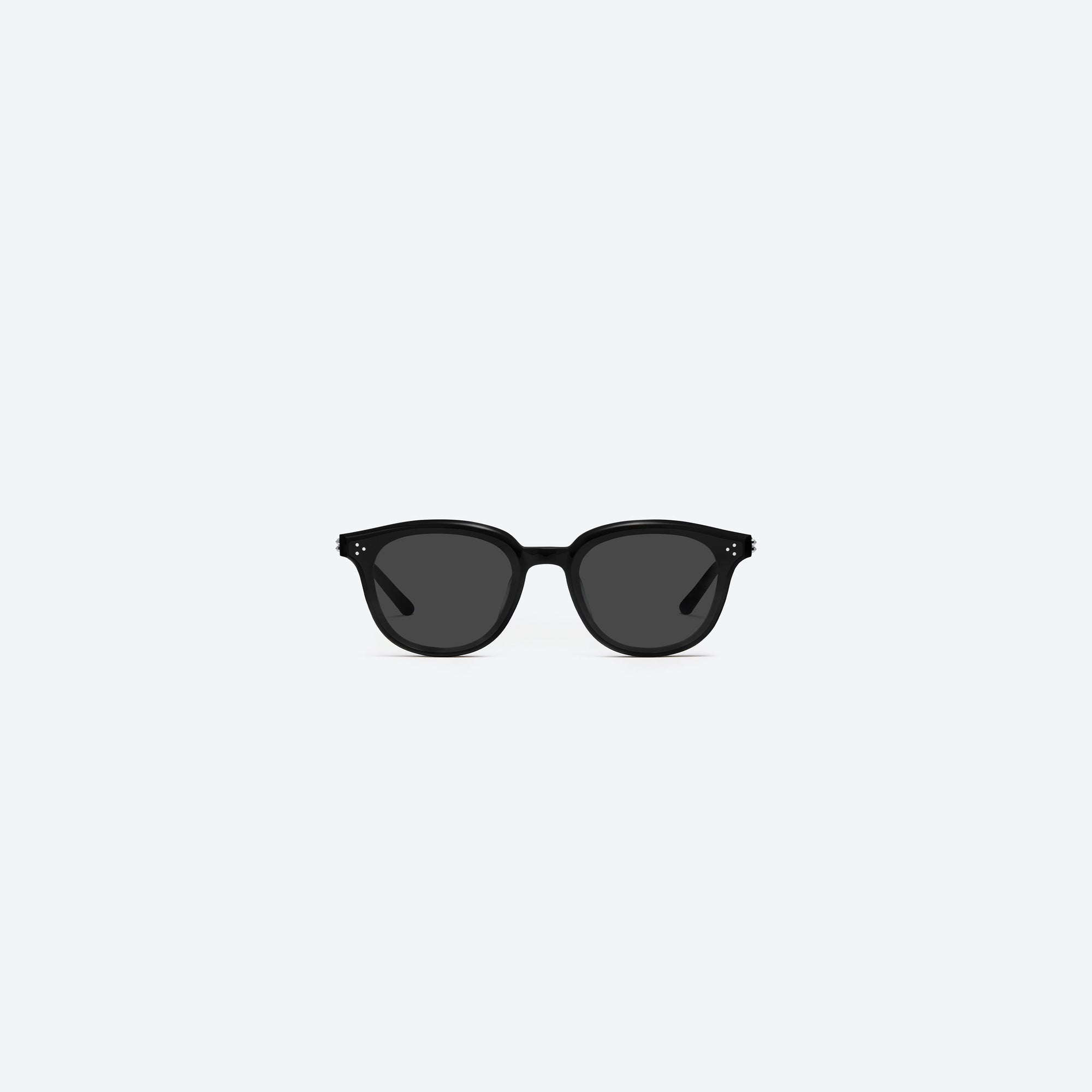 A front view of Gentle Monster Dean 01 Black Acetate framed Round sunglasses.