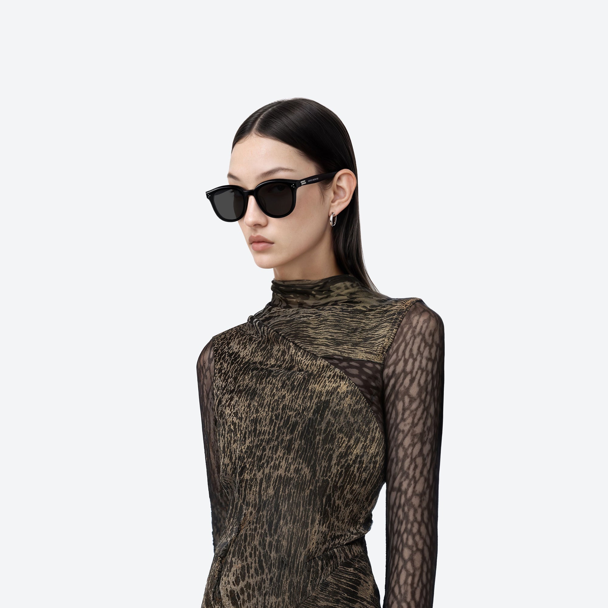 Model wearing the Dean 01 Black Acetate framed Round sunglasses.