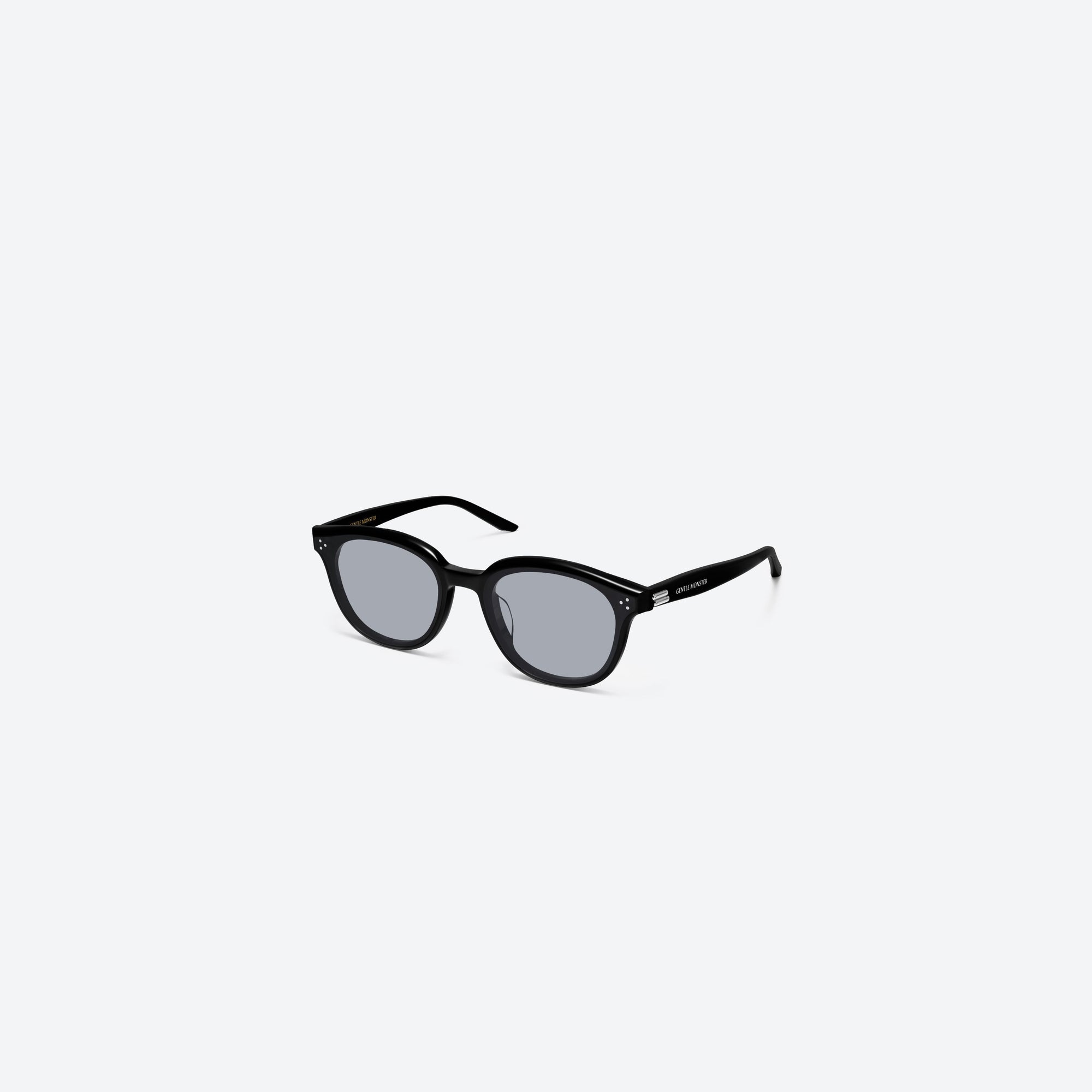 45-degree view of Gentle Monster Dean 01(G) Black Acetate framed Round sunglasses.