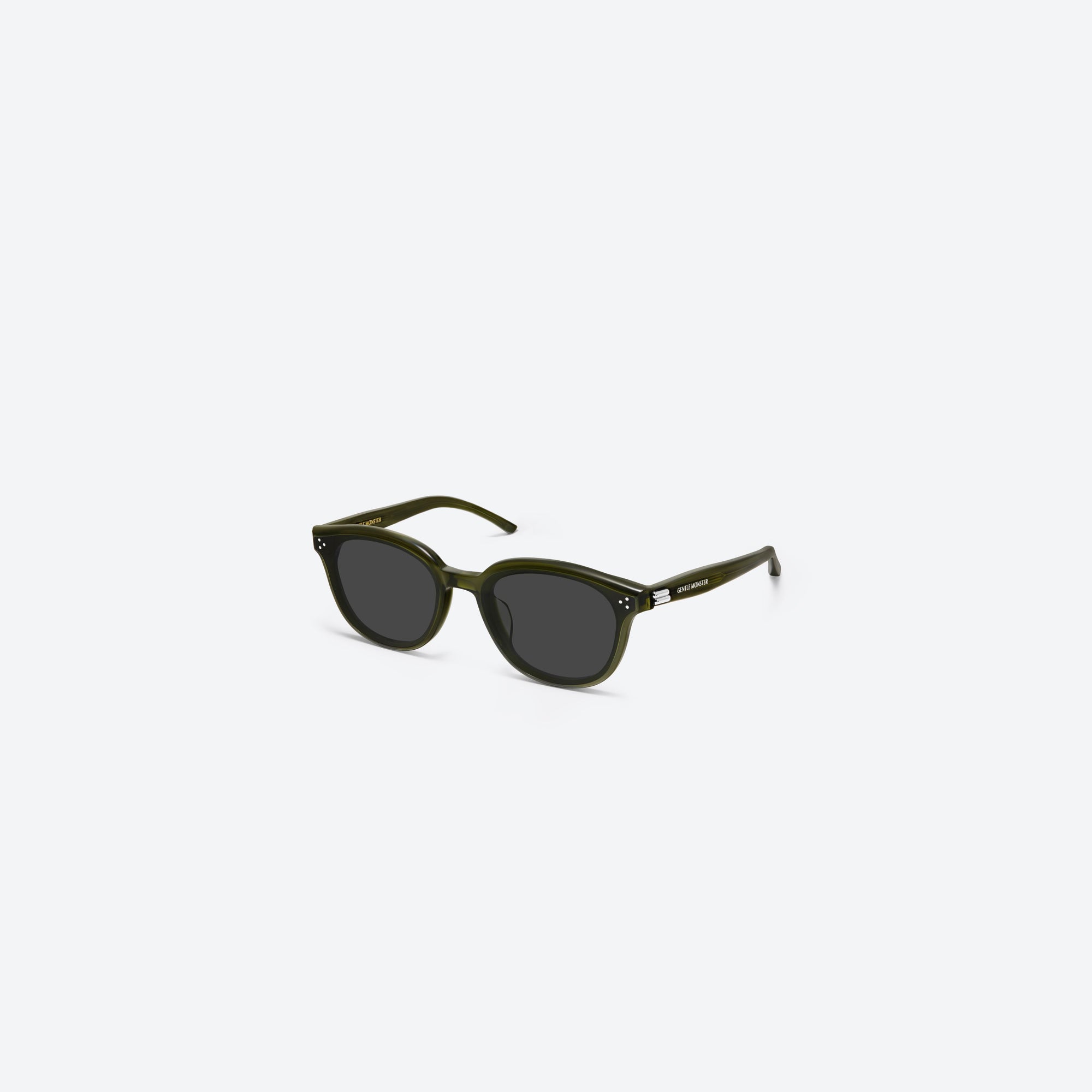 45-degree view of Gentle Monster Dean KC2 Green Acetate framed Round sunglasses.
