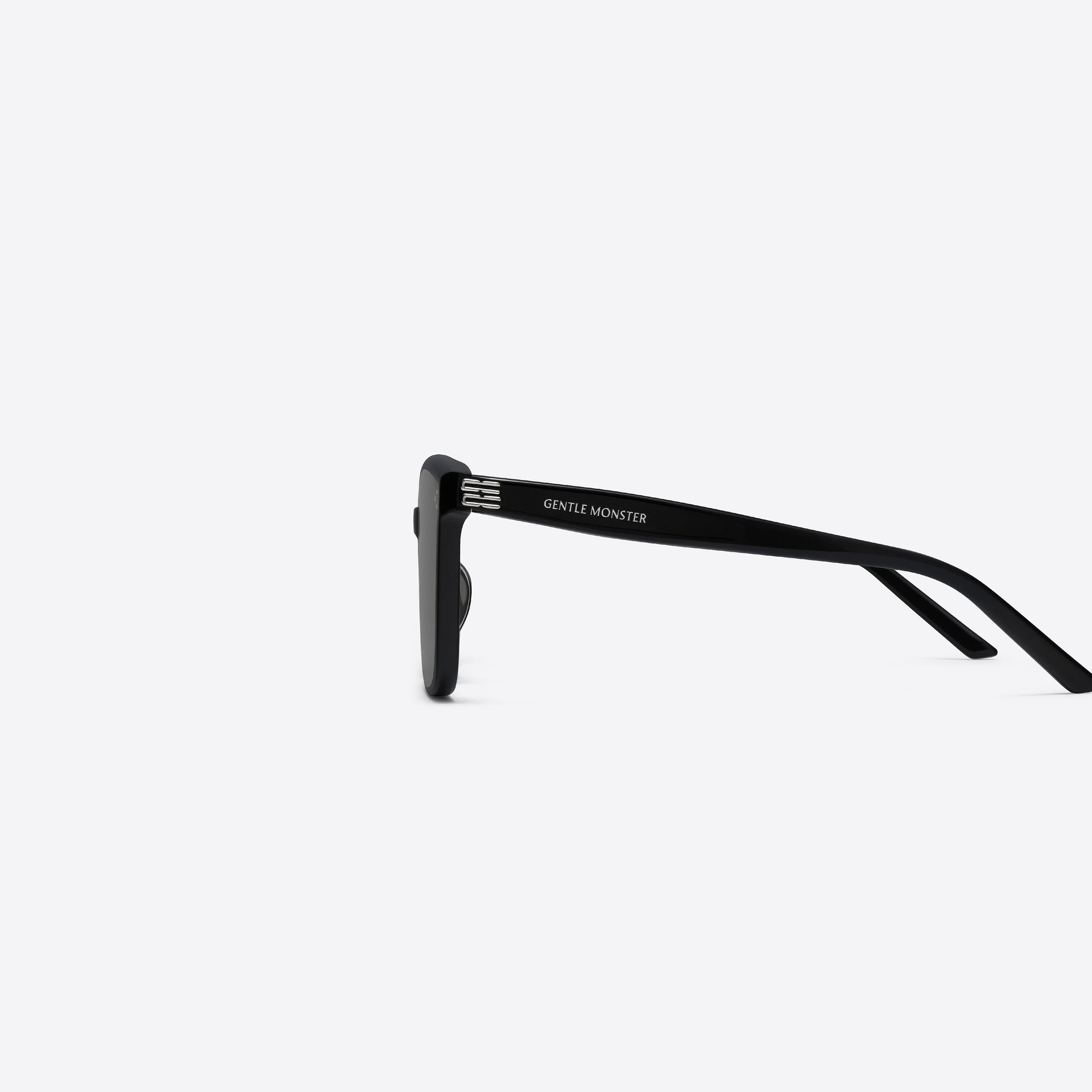 A detailed left view of Gentle Monster My Me 01 Black Acetate framed Square sunglasses.