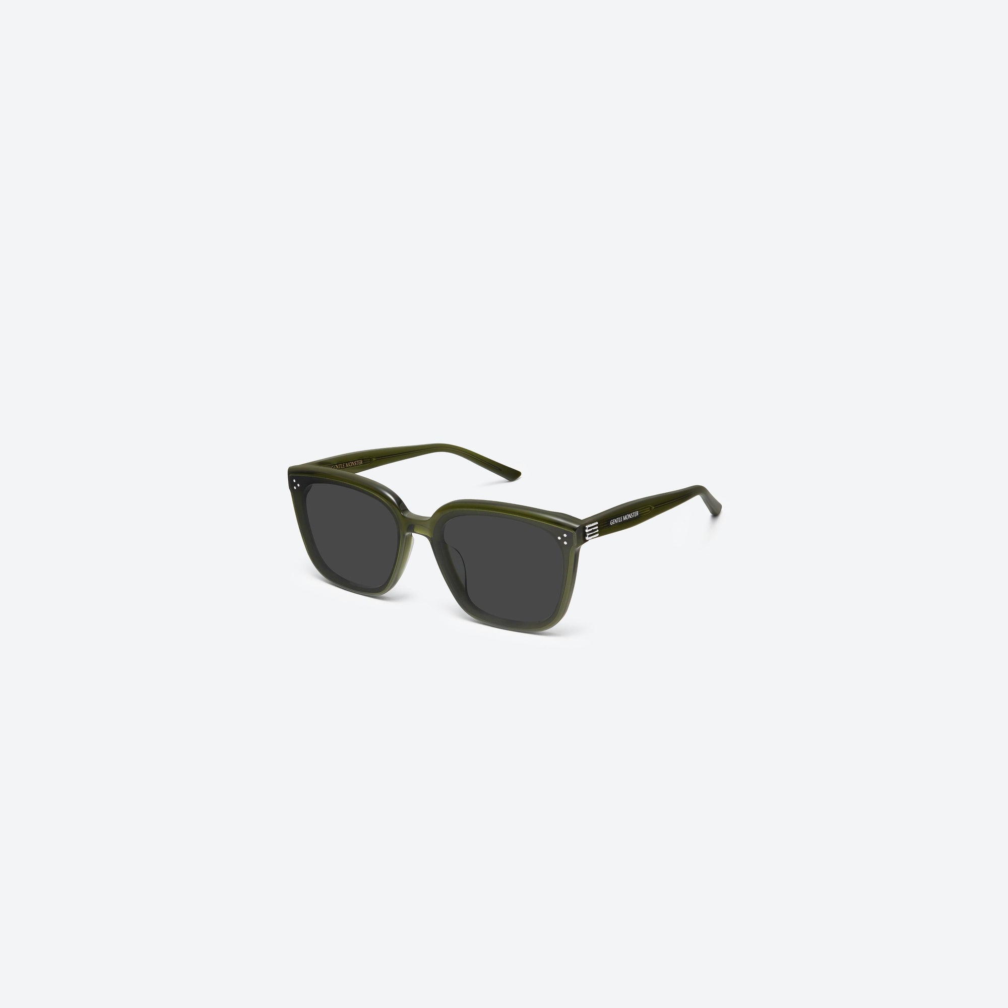 45-degree view of Gentle Monster My Me KC2 Green Acetate framed Square sunglasses.