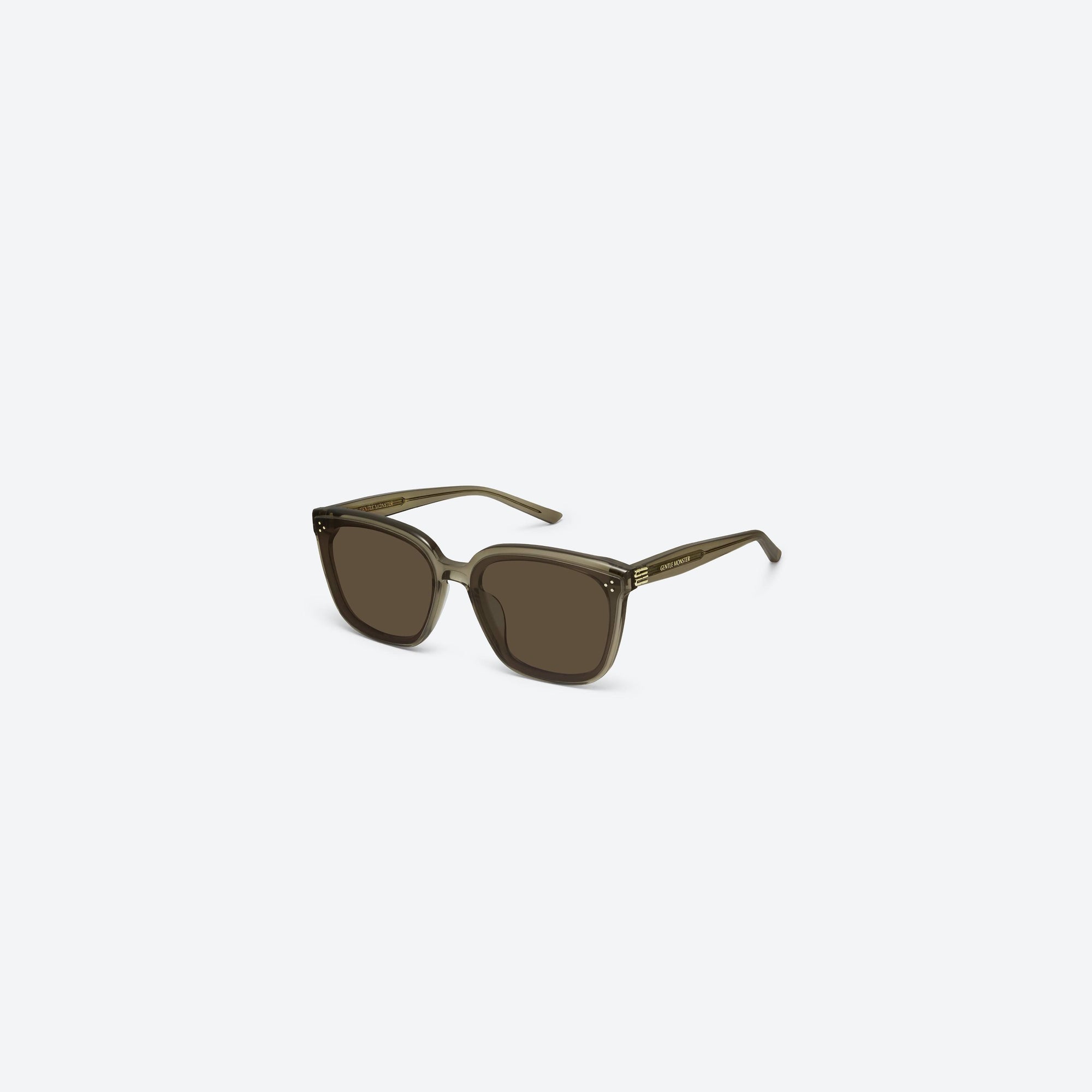 45-degree view of Gentle Monster My Me KC6 Green Acetate framed Square sunglasses.