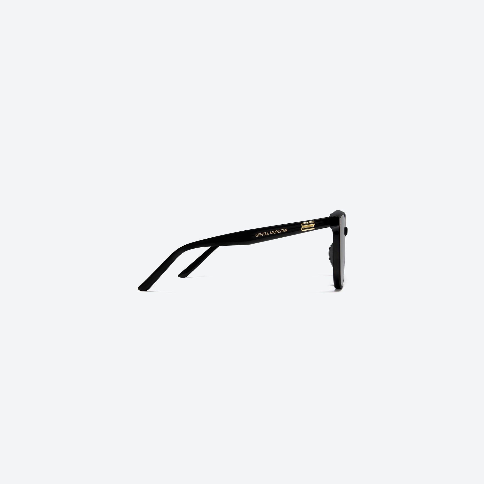 A detailed right view of Gentle Monster Lady Lang 01 Black Acetate framed Round sunglasses.