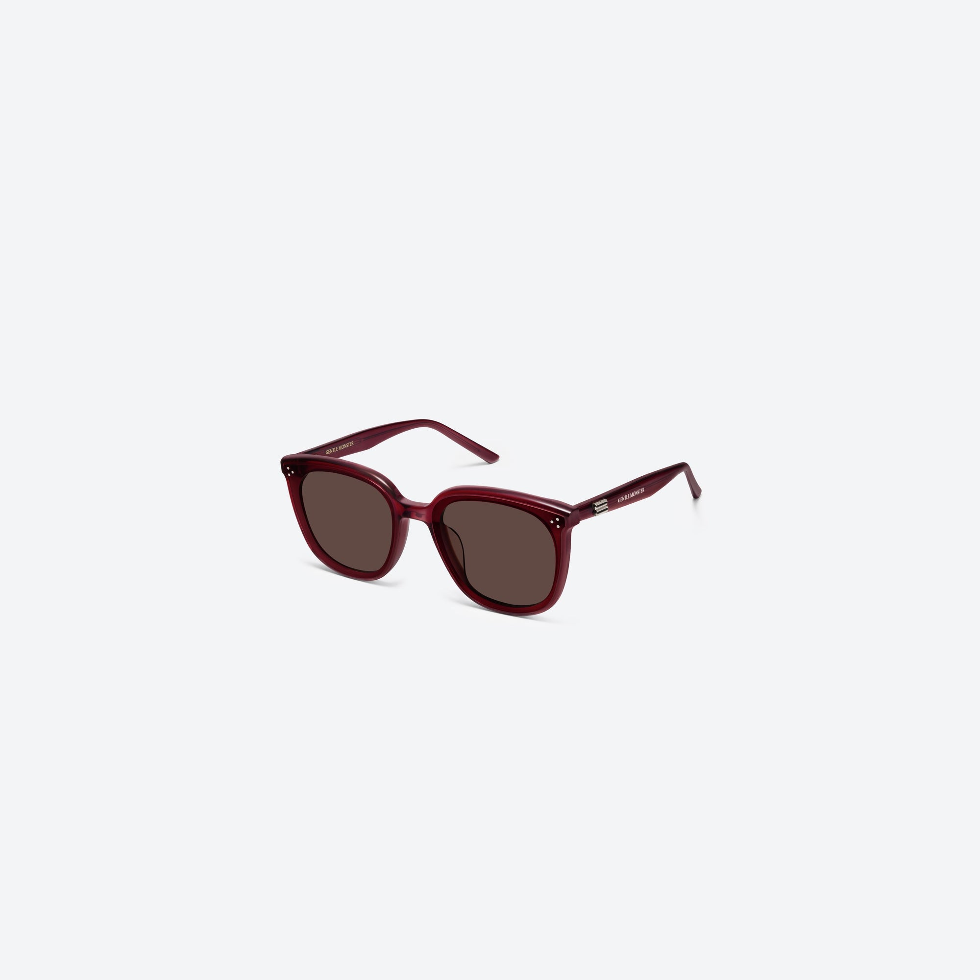 45-degree view of Gentle Monster Lady Lang RC3 Red Acetate framed Round sunglasses.