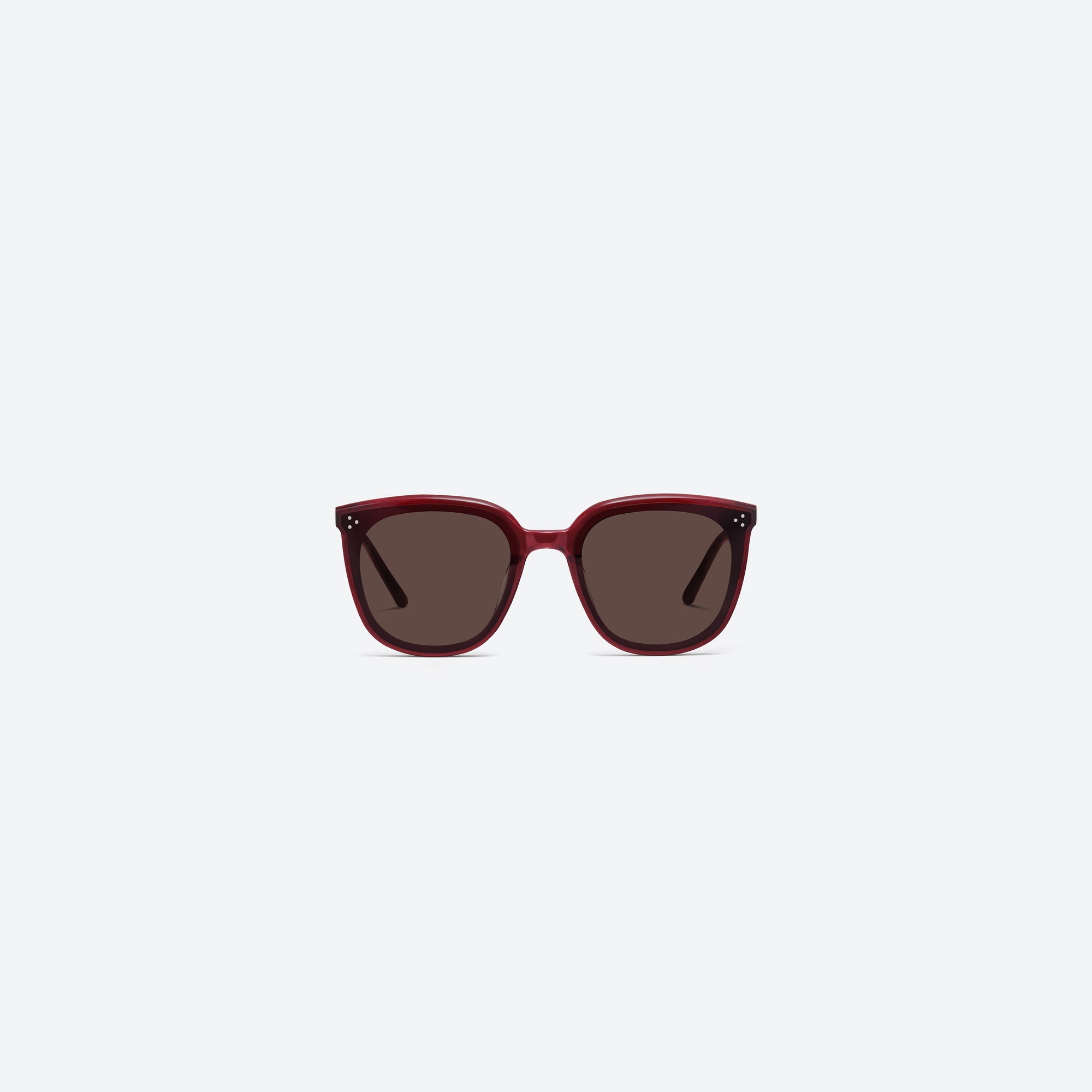 A front view of Gentle Monster Lady Lang RC3 Red Acetate framed Round sunglasses.