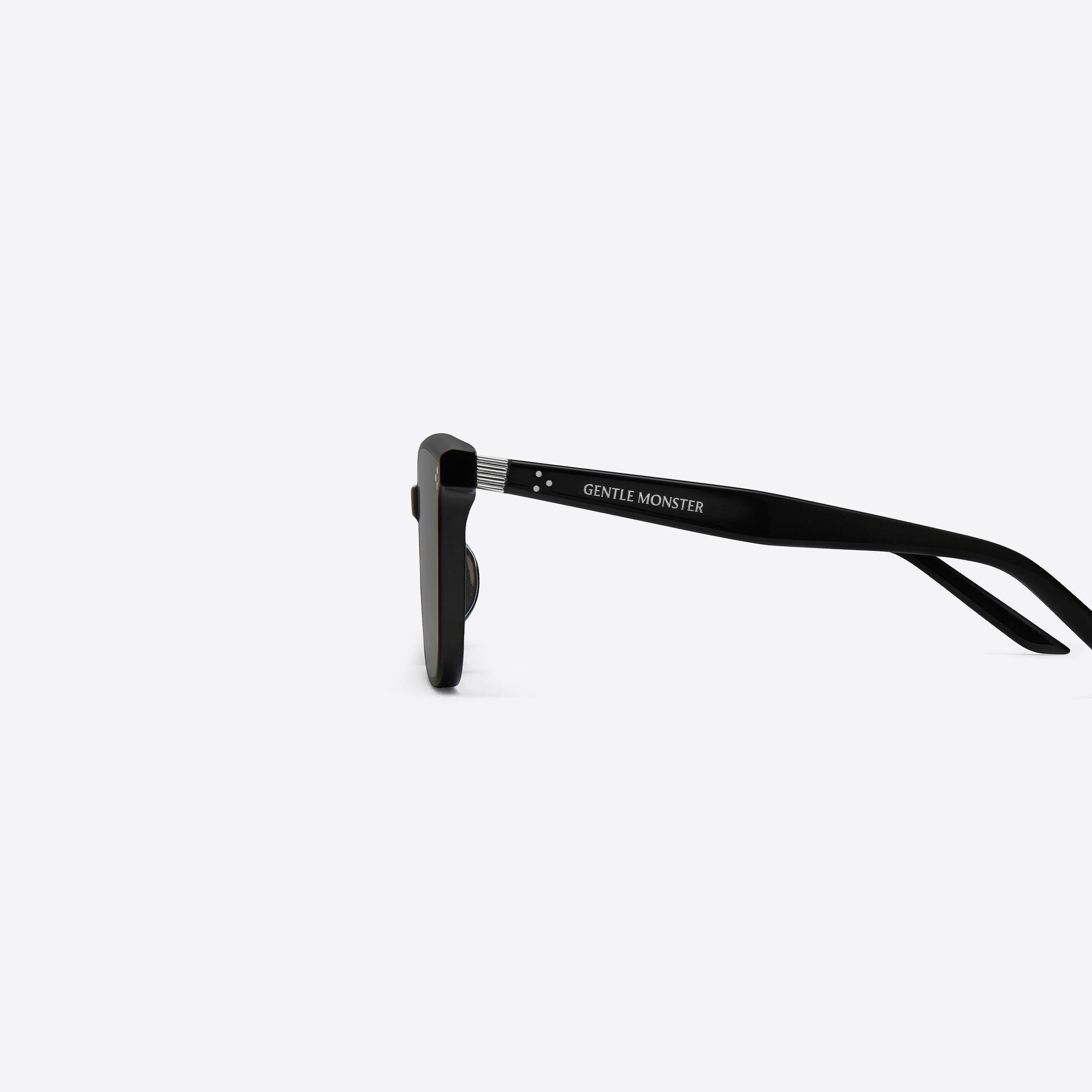 A detailed left view of Gentle Monster By Row 01 Black Acetate framed Square sunglasses.