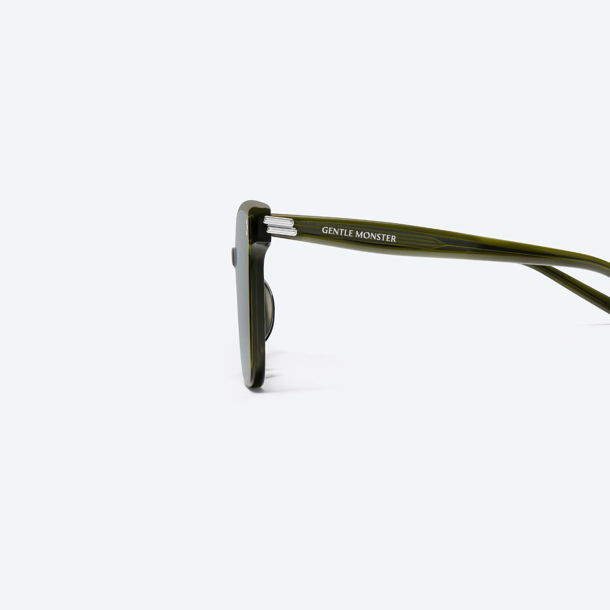A detailed left view of Gentle Monster New Her KC2 Green Acetate framed Square sunglasses.