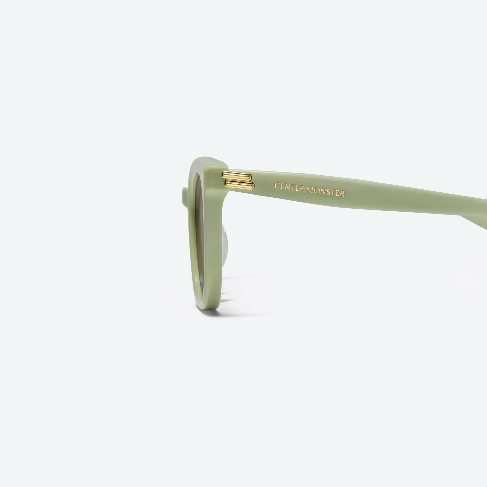 A detailed left view of Gentle Monster Bloomo GR9 Green Acetate framed Square sunglasses.