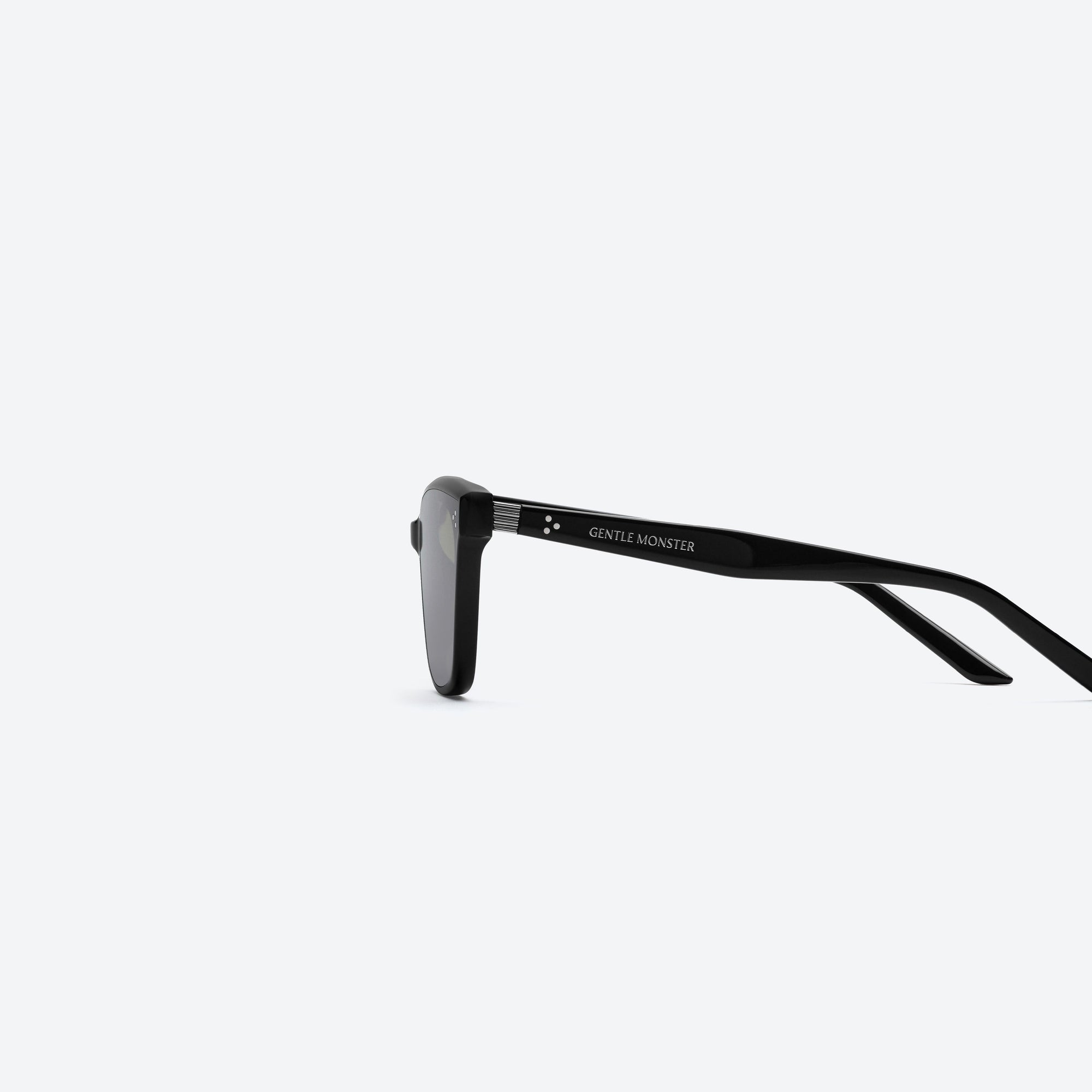 A detailed left view of Gentle Monster Numer 01(G) Similar Black Acetate framed Square sunglasses.