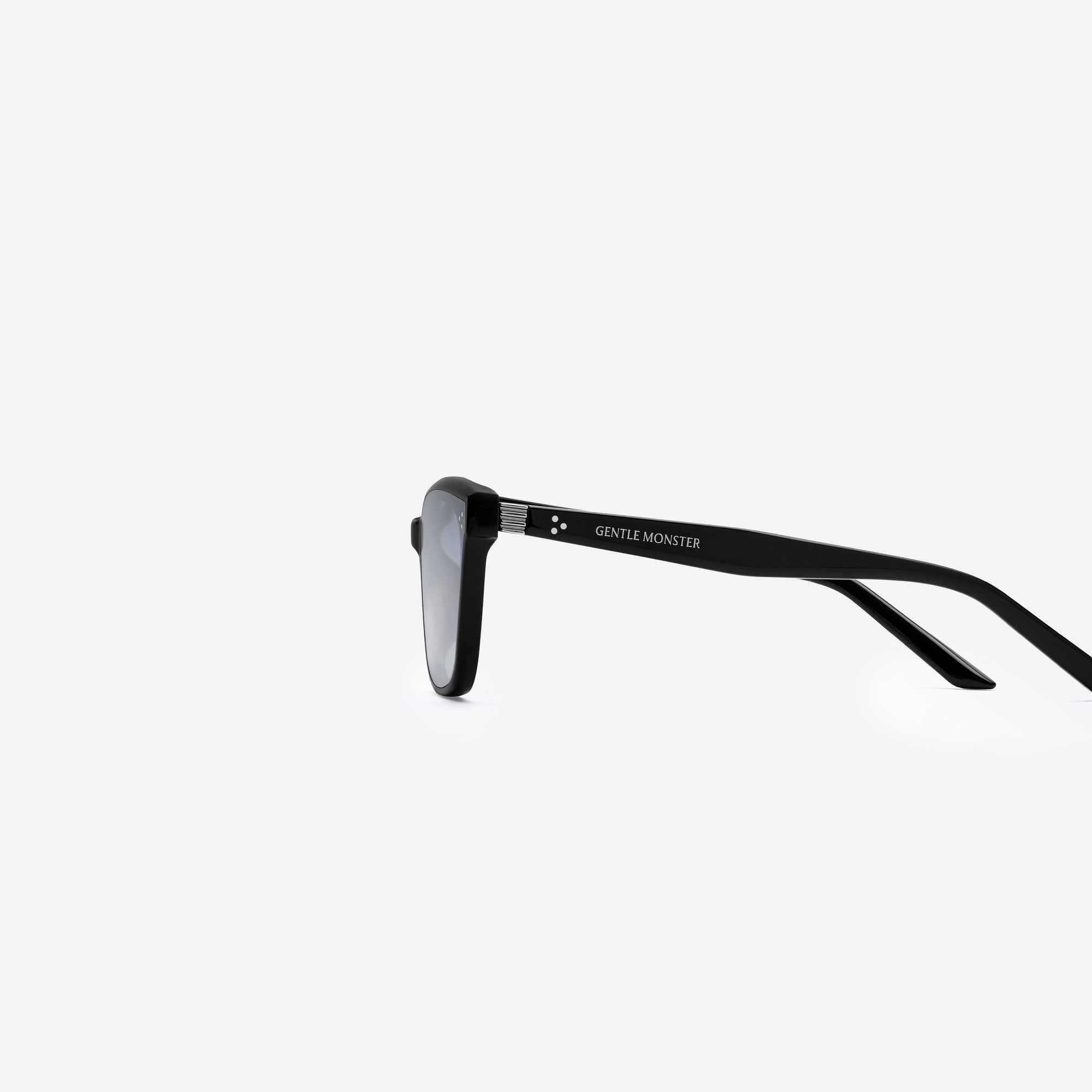A detailed left view of Gentle Monster Numer 01(BLG) Black Acetate framed Square sunglasses.