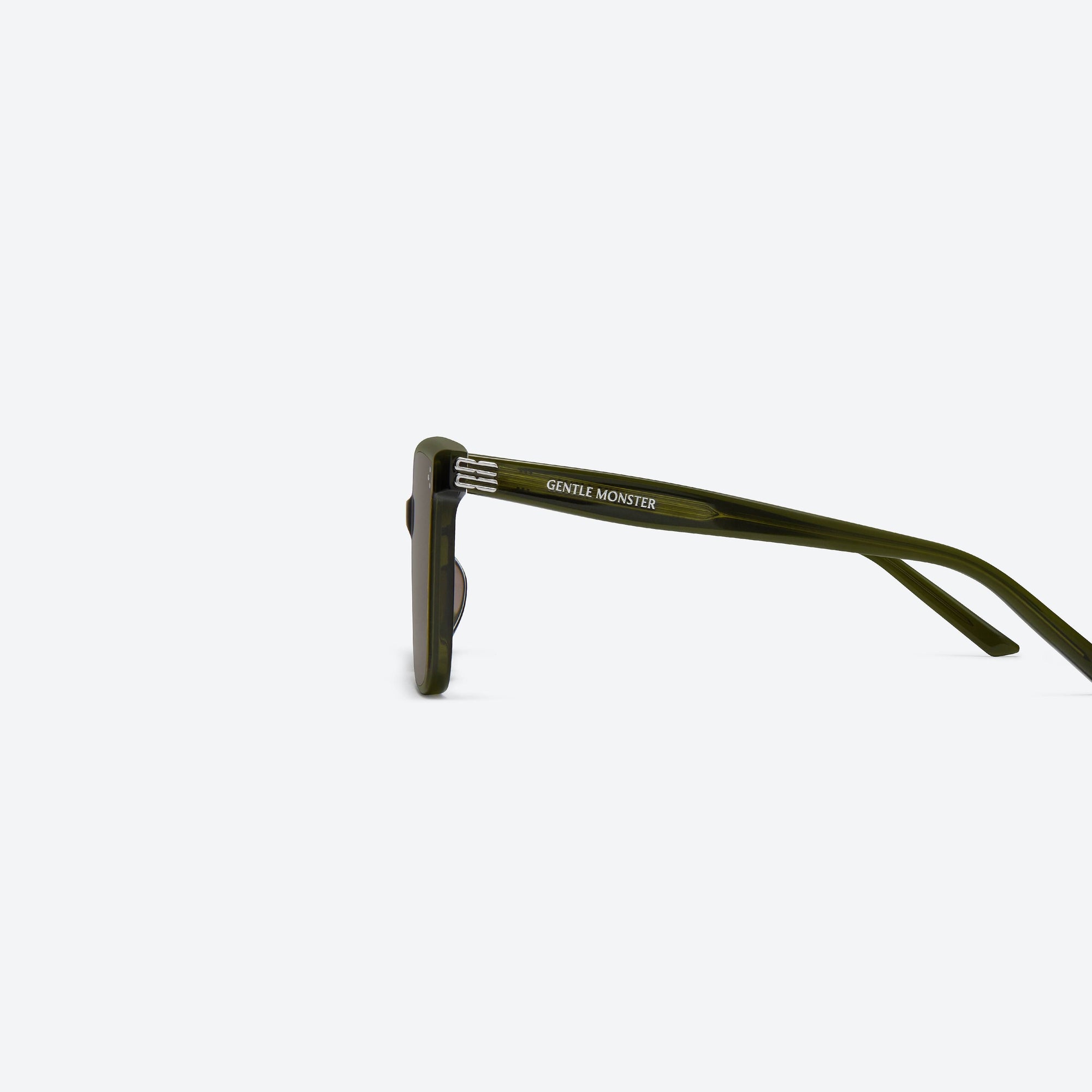 A detailed left view of Gentle Monster Piana KC2 Green Acetate framed Square sunglasses.