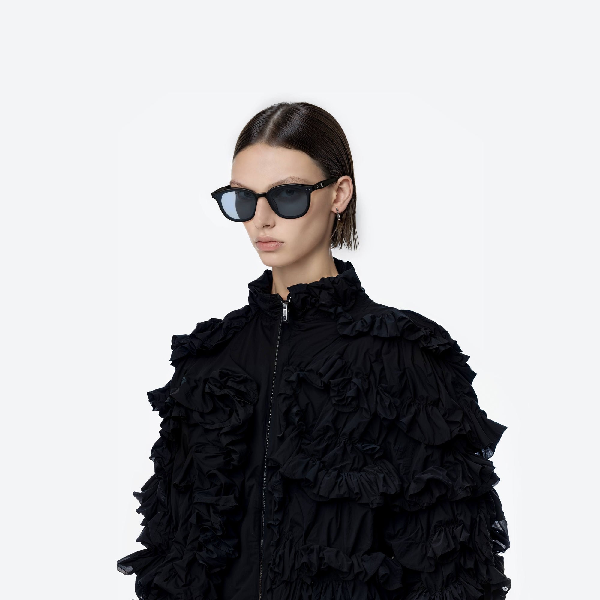 Model wearing the Jude 01(BL) Black Acetate framed Round sunglasses.
