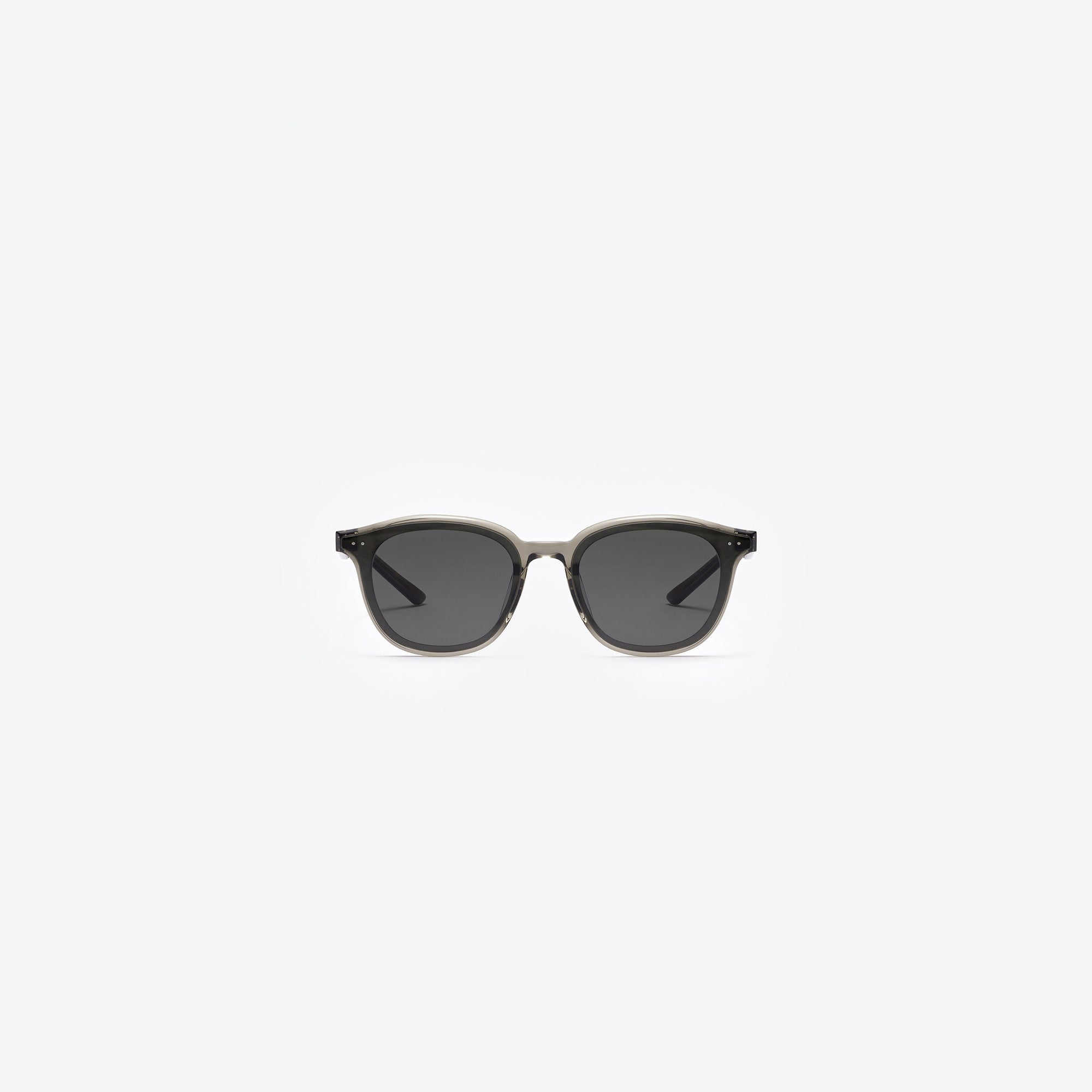 A front view of Gentle Monster Jude BRC17 Brown Acetate framed Round sunglasses.