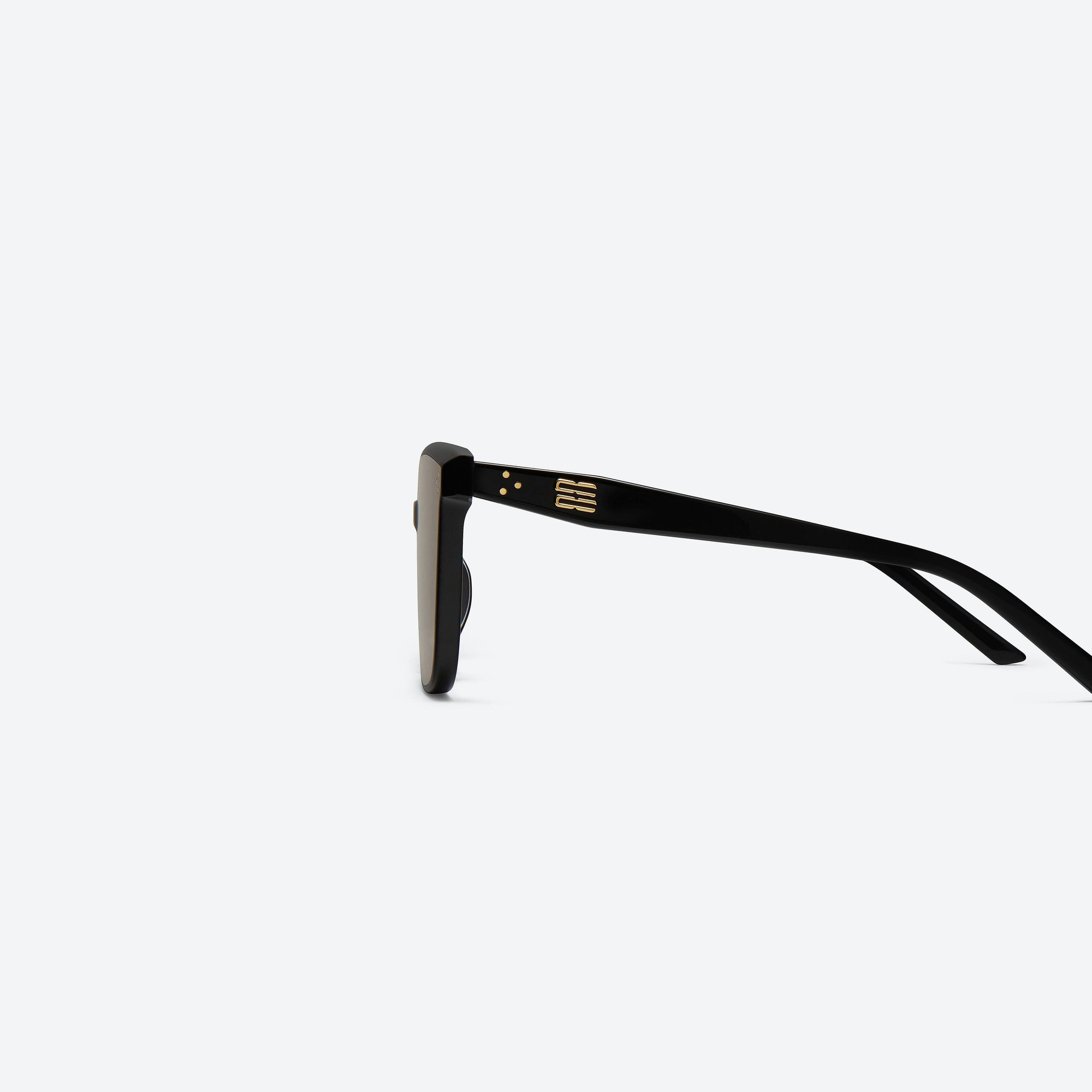 A detailed left view of Gentle Monster Loloe 01(BR) Black Acetate framed Square sunglasses.