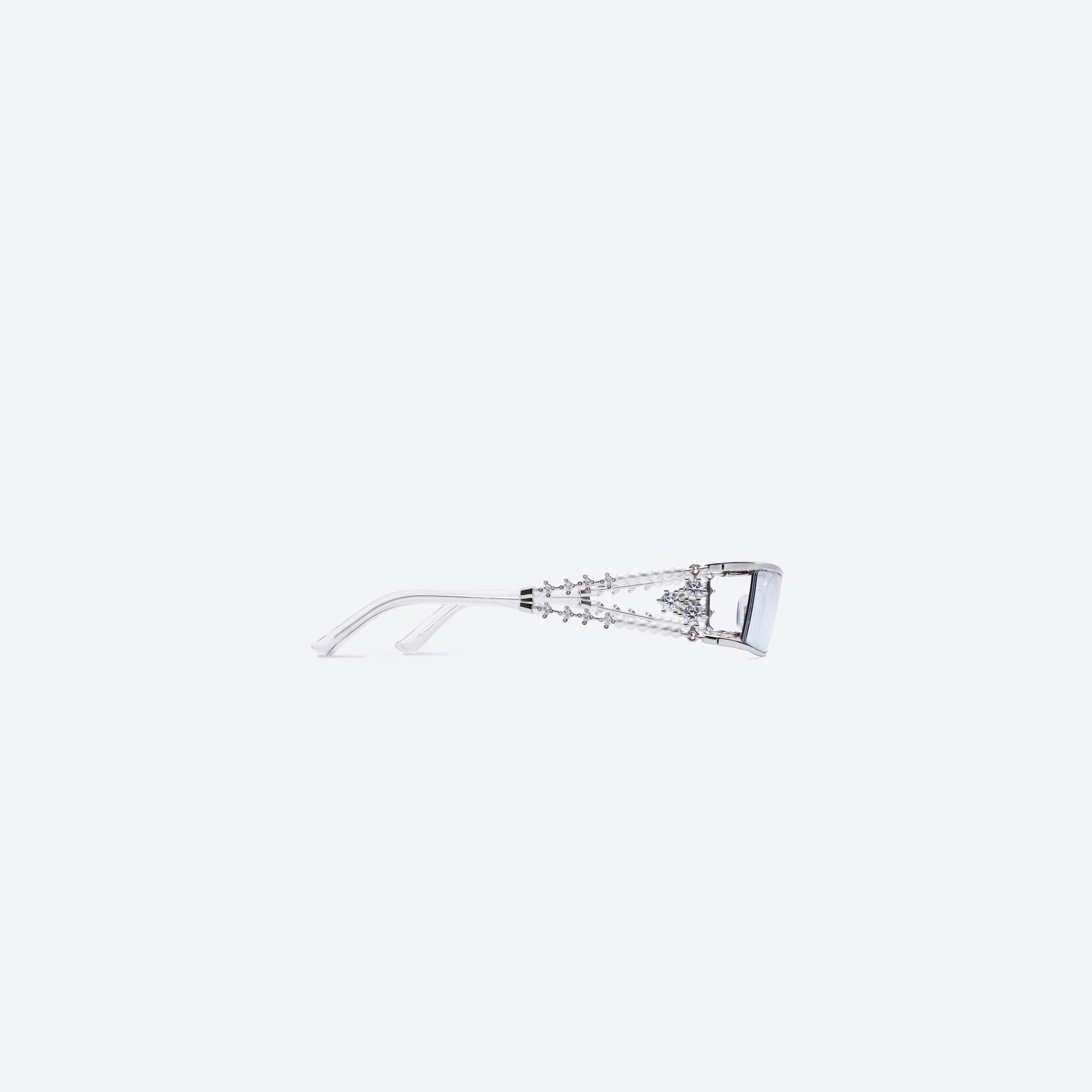 A detailed right view of Gentle Monster Kiira 02(BLM) Silver Metal framed Square sunglasses.