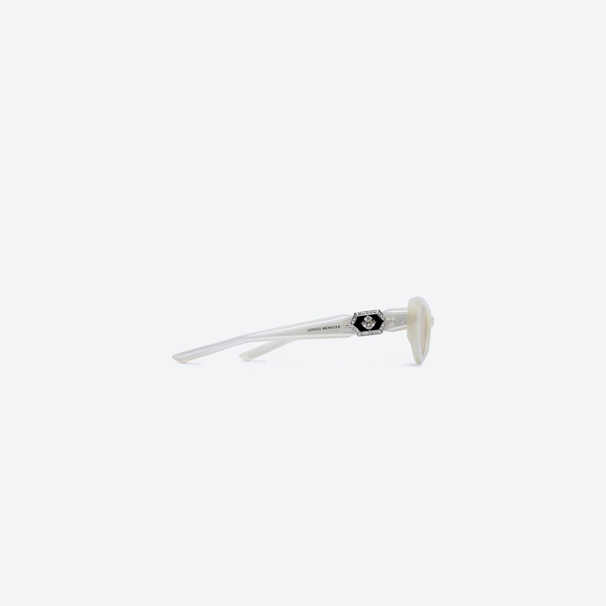 A detailed right view of Gentle Monster Ruvy Van WC6 White Acetate framed Cat-eye sunglasses.